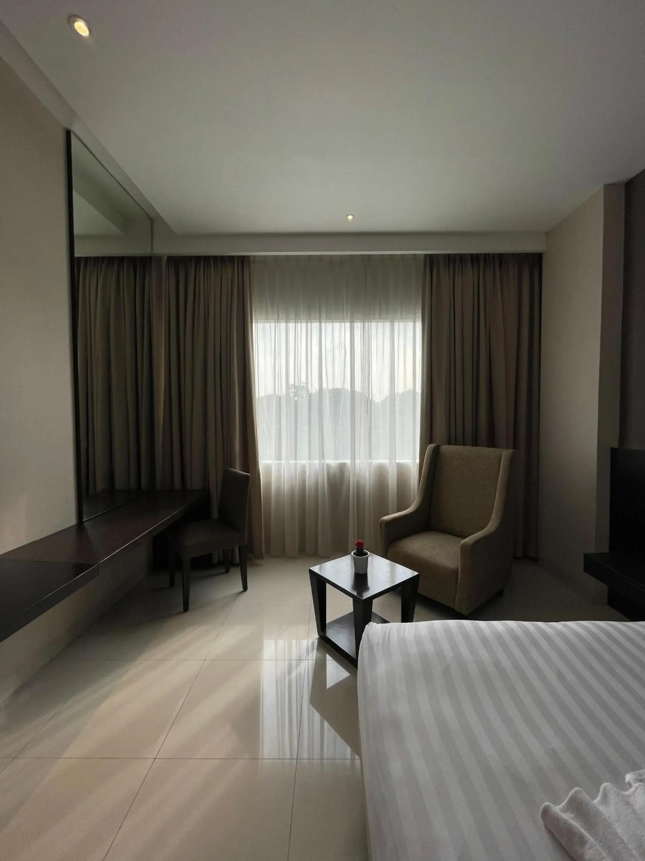 Bed in Grand Arjuna Hotel Bed in Grand Arjuna Hotel