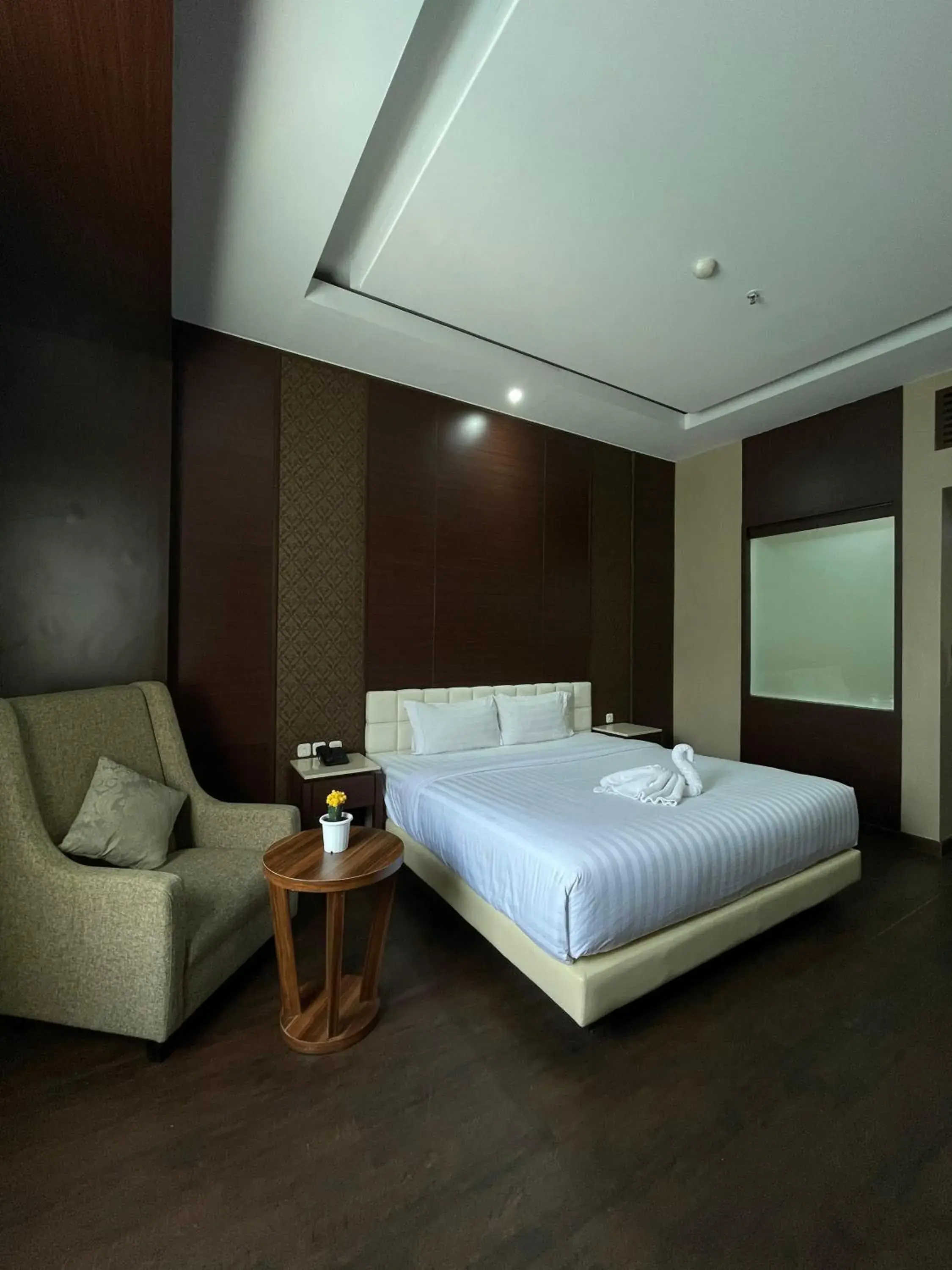 Bed in Grand Arjuna Hotel Bed in Grand Arjuna Hotel