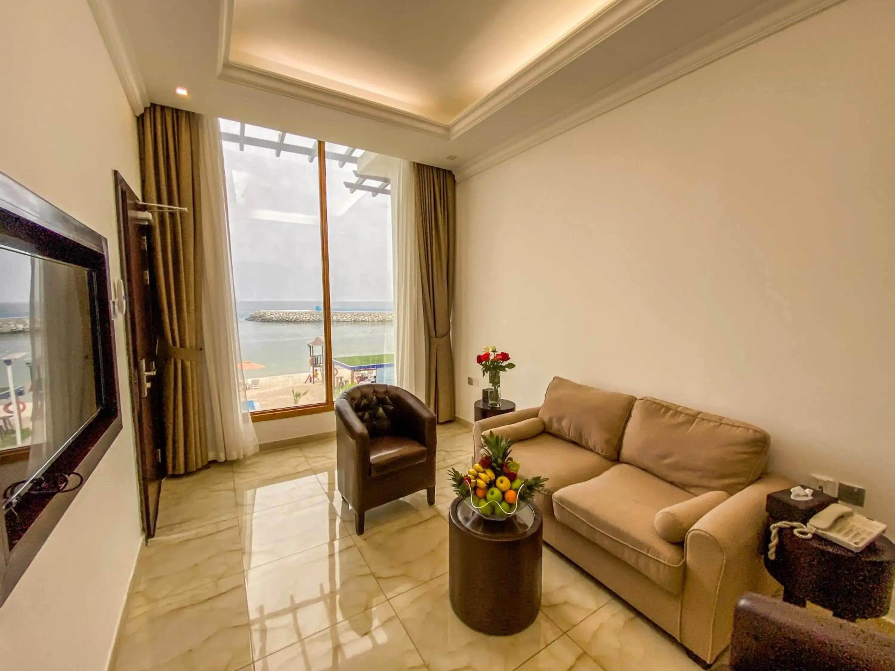 Living room in Mirage Bab Al Bahr Hotel Living room in Mirage Bab Al Bahr Hotel