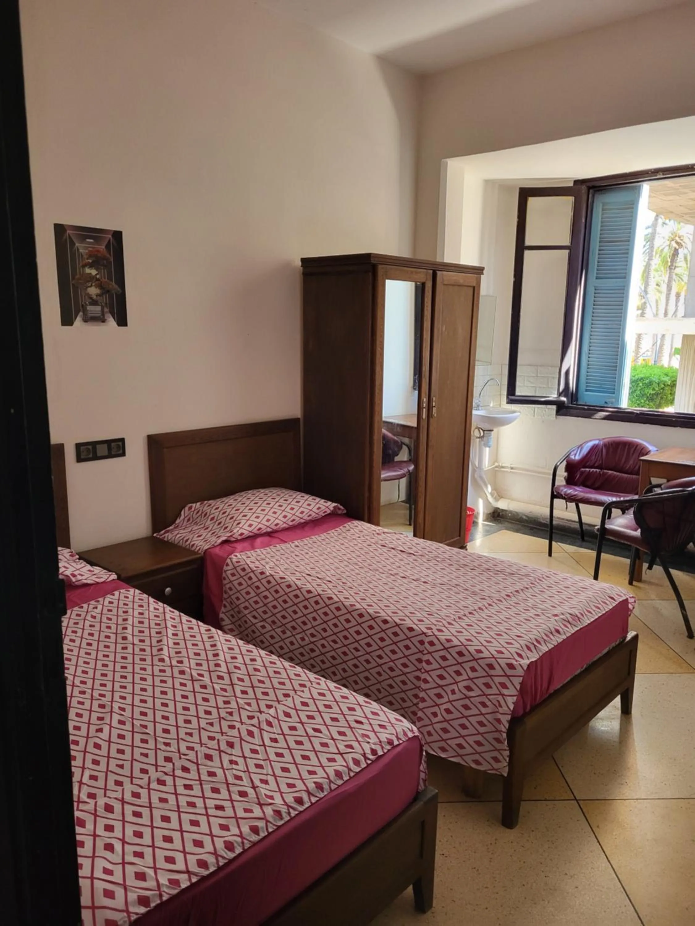 Bed in Hotel El Maghreb Al Kabir