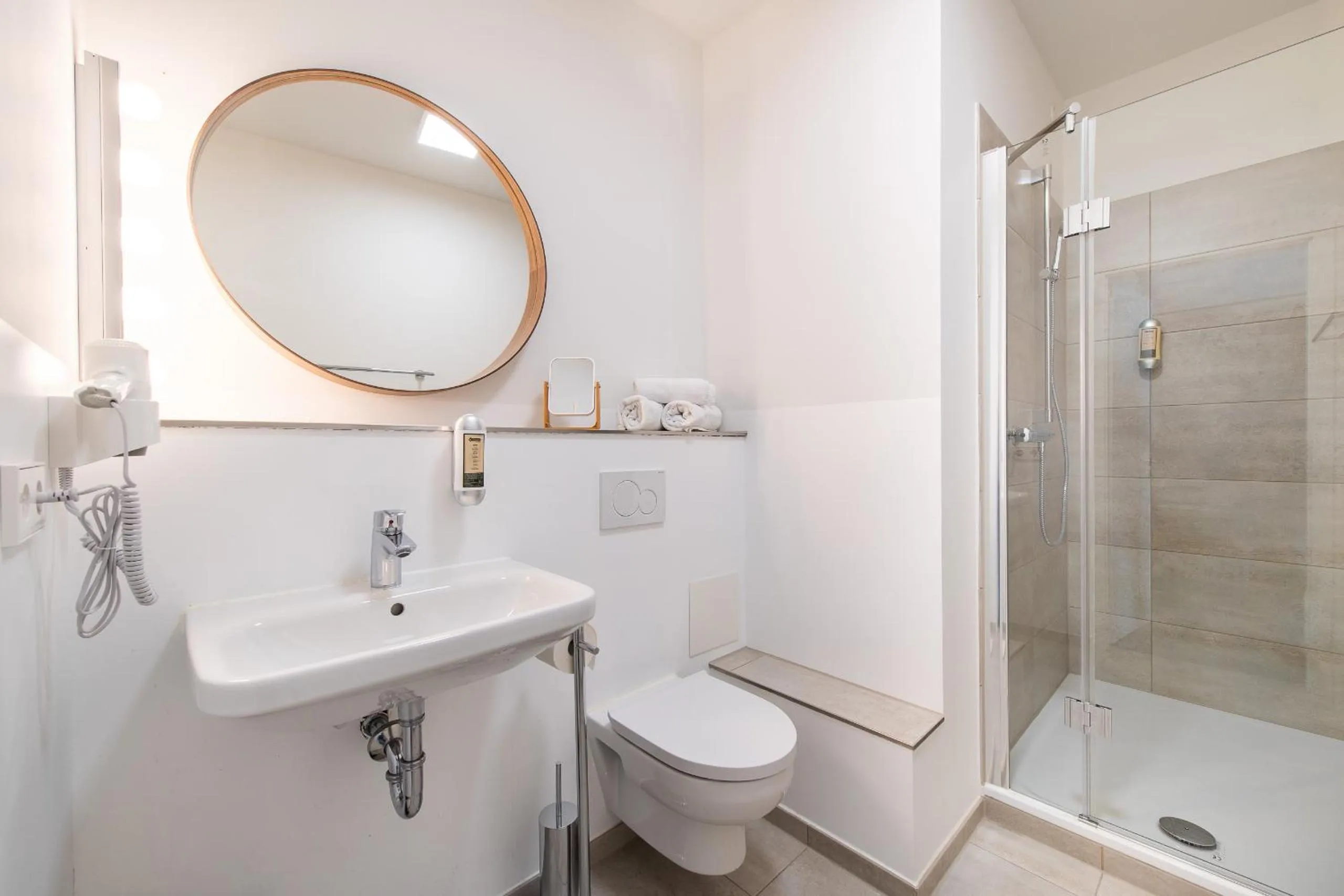 Bathroom in Metropol Apartments & Suites