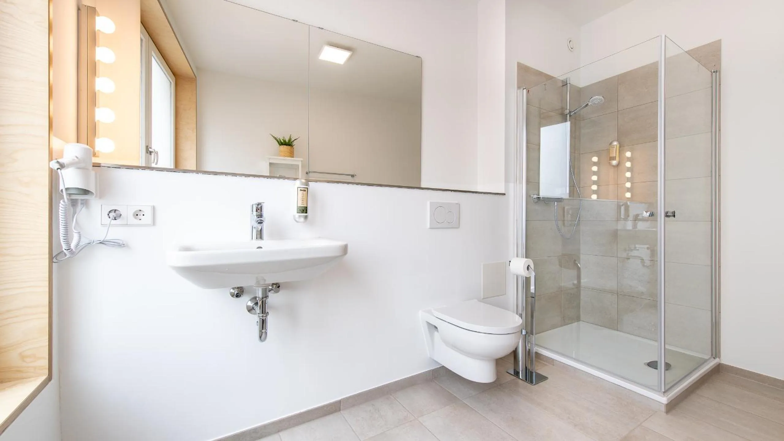 Bathroom in Metropol Apartments & Suites