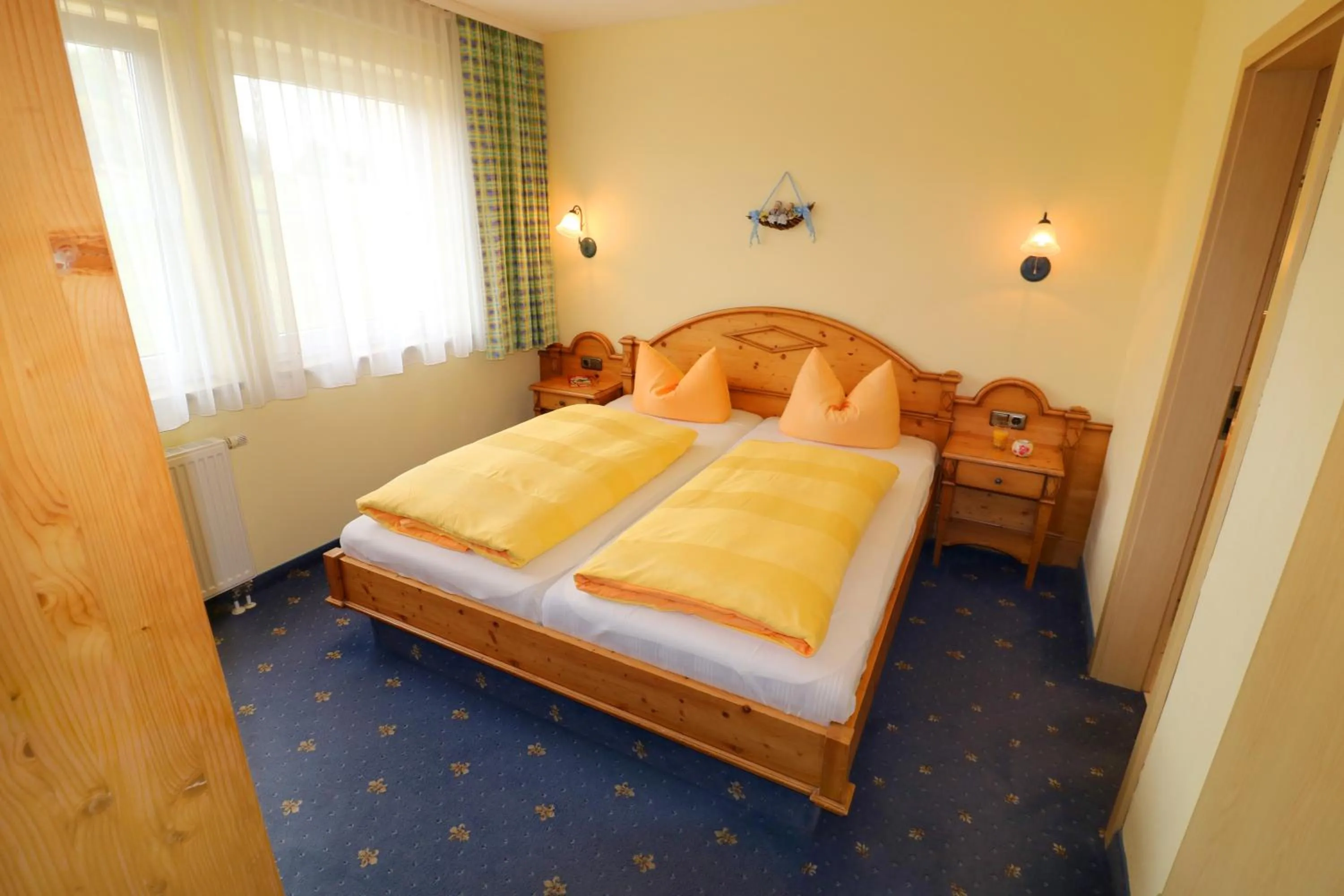 Bed in Ferienwohnung Zur Hopfenkönigin