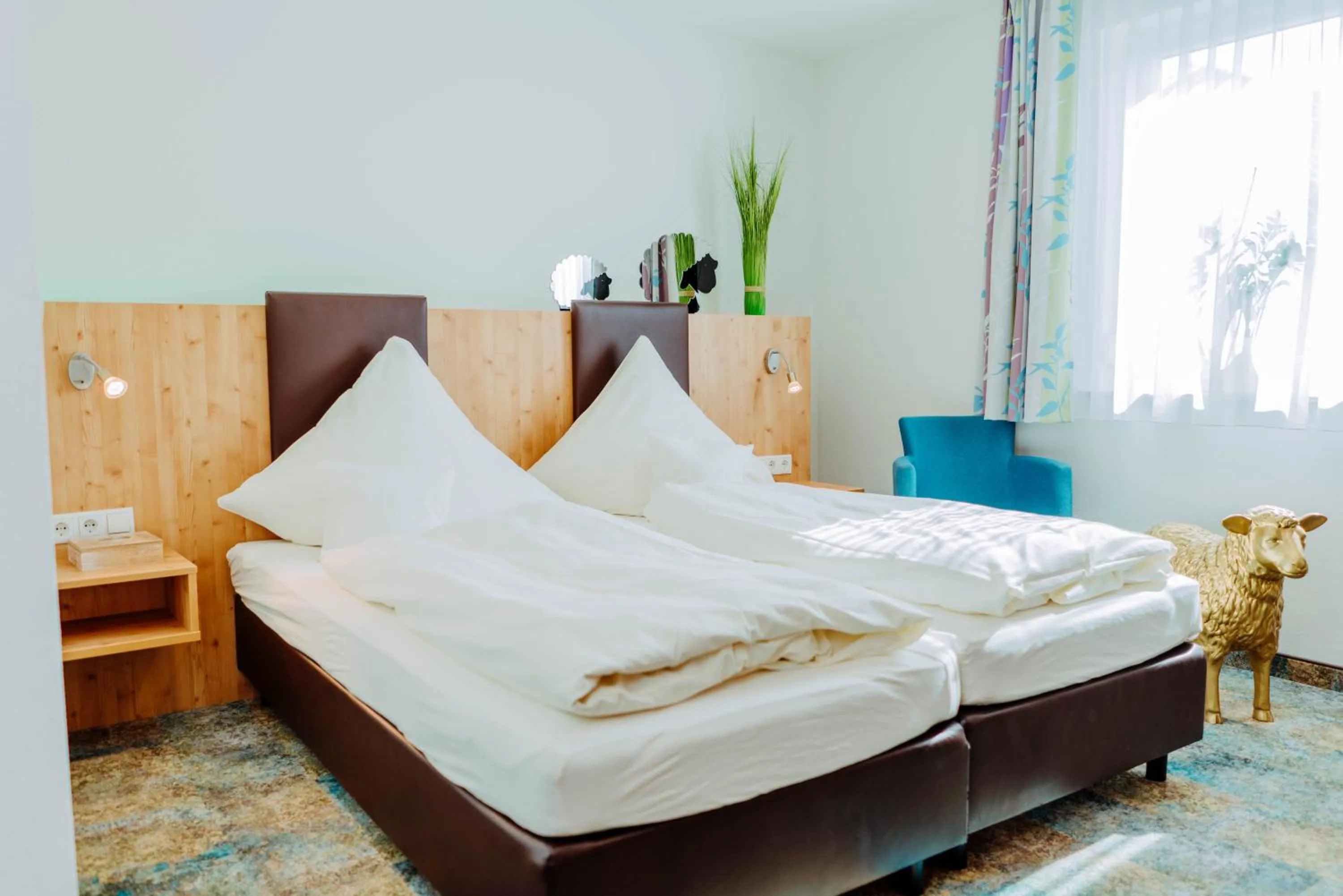 Bed in Garni-Hotel Goldenes Lamm