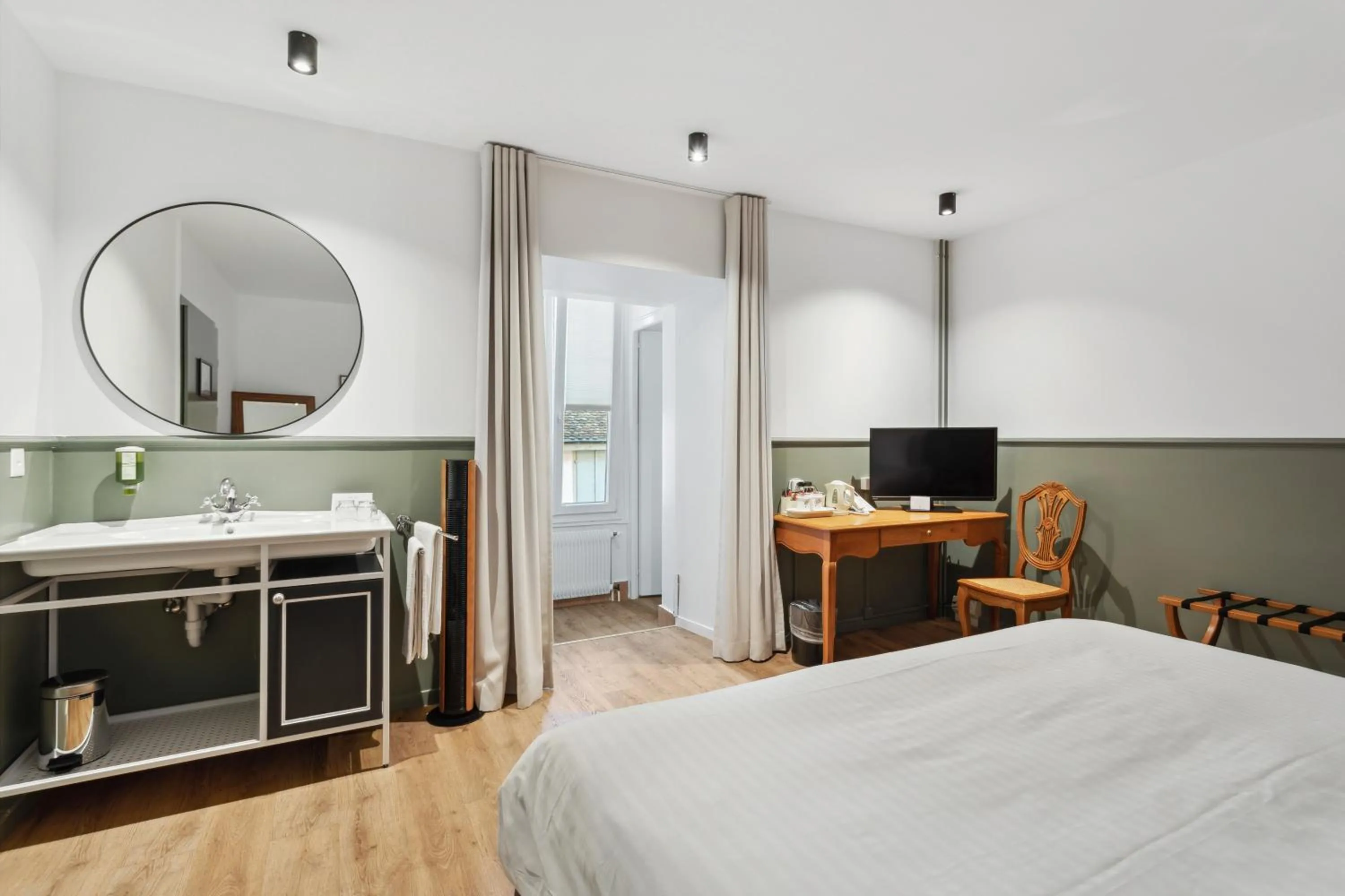 Photo of the whole room, Bed in Hôtel de la Couronne