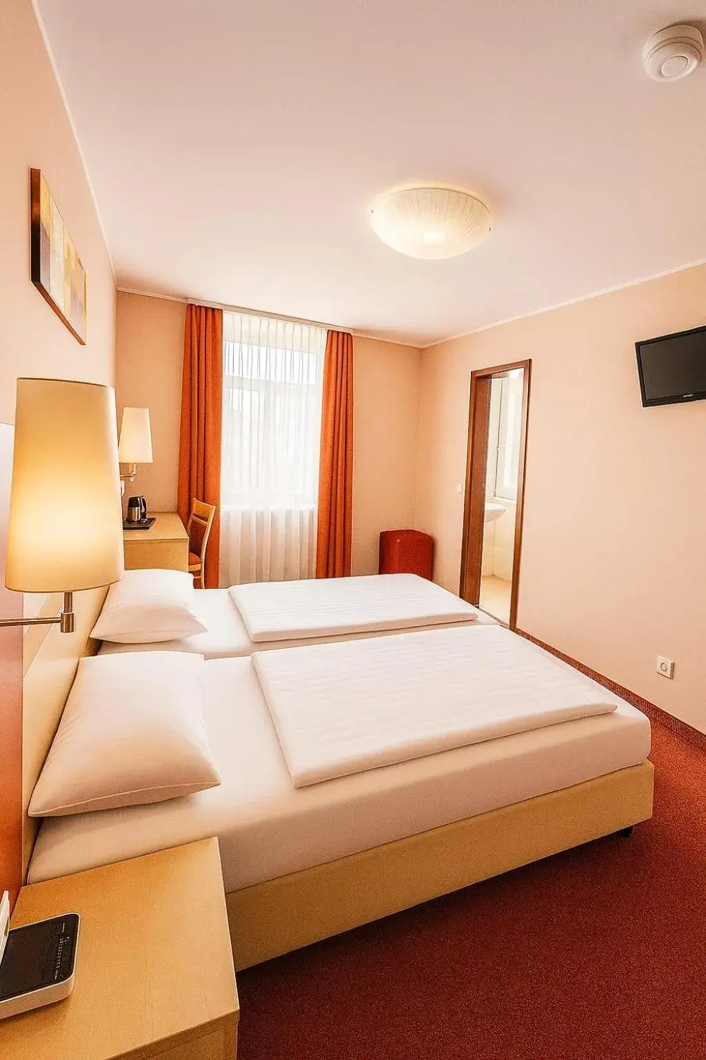 Photo of the whole room, Bed in Atomis Hotel Düsseldorf City Photo of the whole room, Bed in Atomis Hotel Düsseldorf City