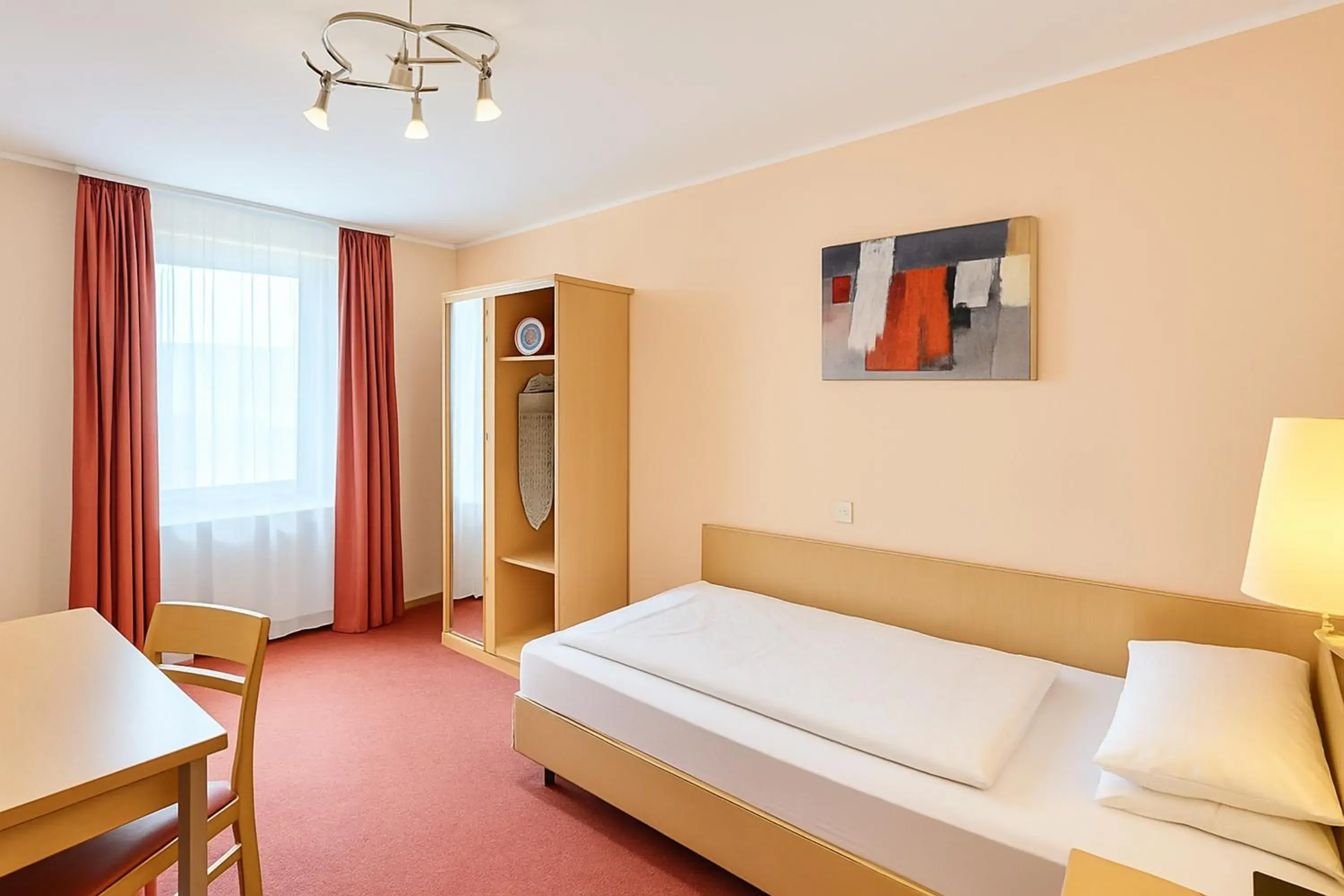 Photo of the whole room, Bed in Atomis Hotel Düsseldorf City Photo of the whole room, Bed in Atomis Hotel Düsseldorf City