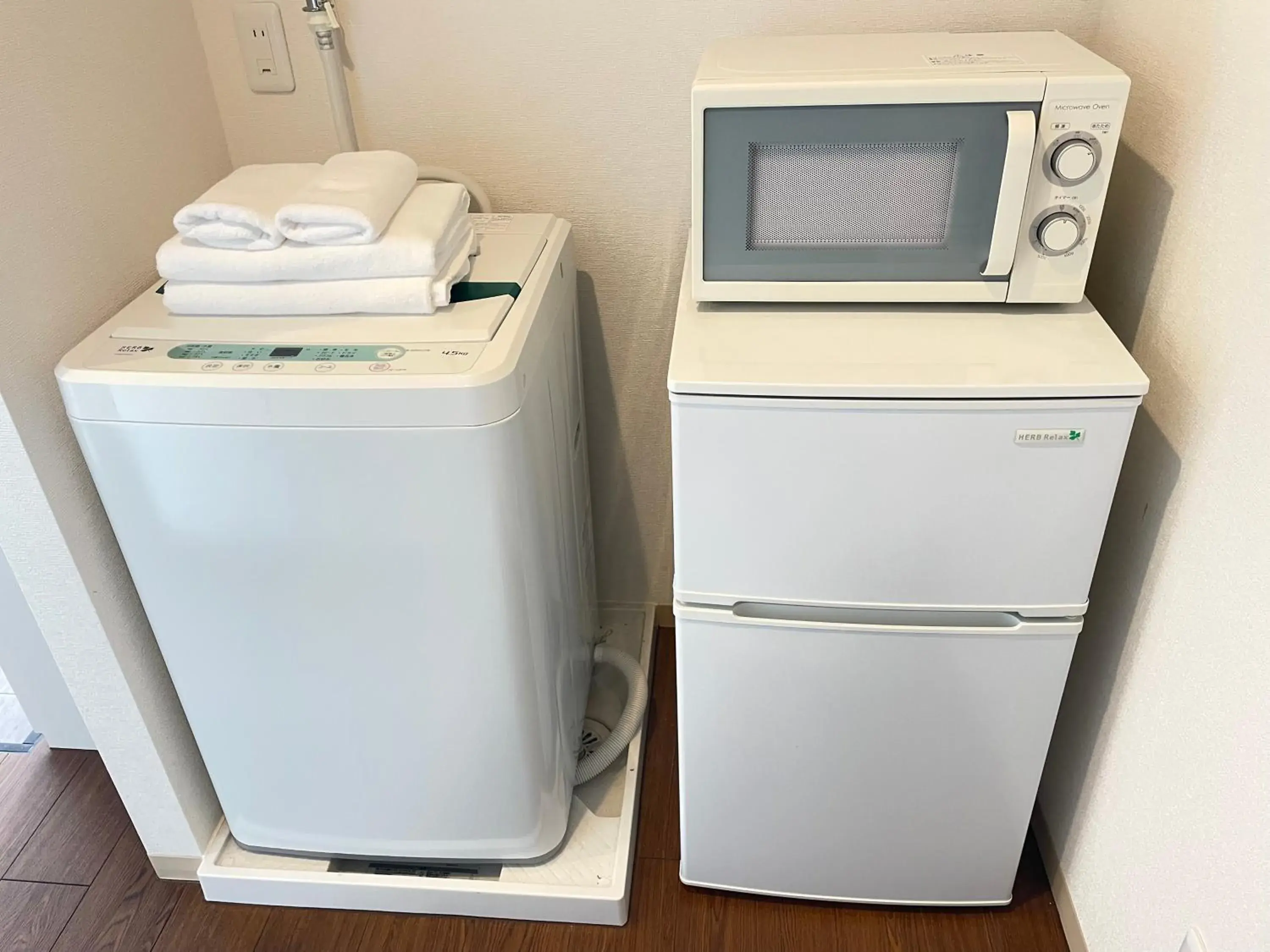 washing machine in BiBi Hotel コンベンションベイ washing machine in BiBi Hotel コンベンションベイ