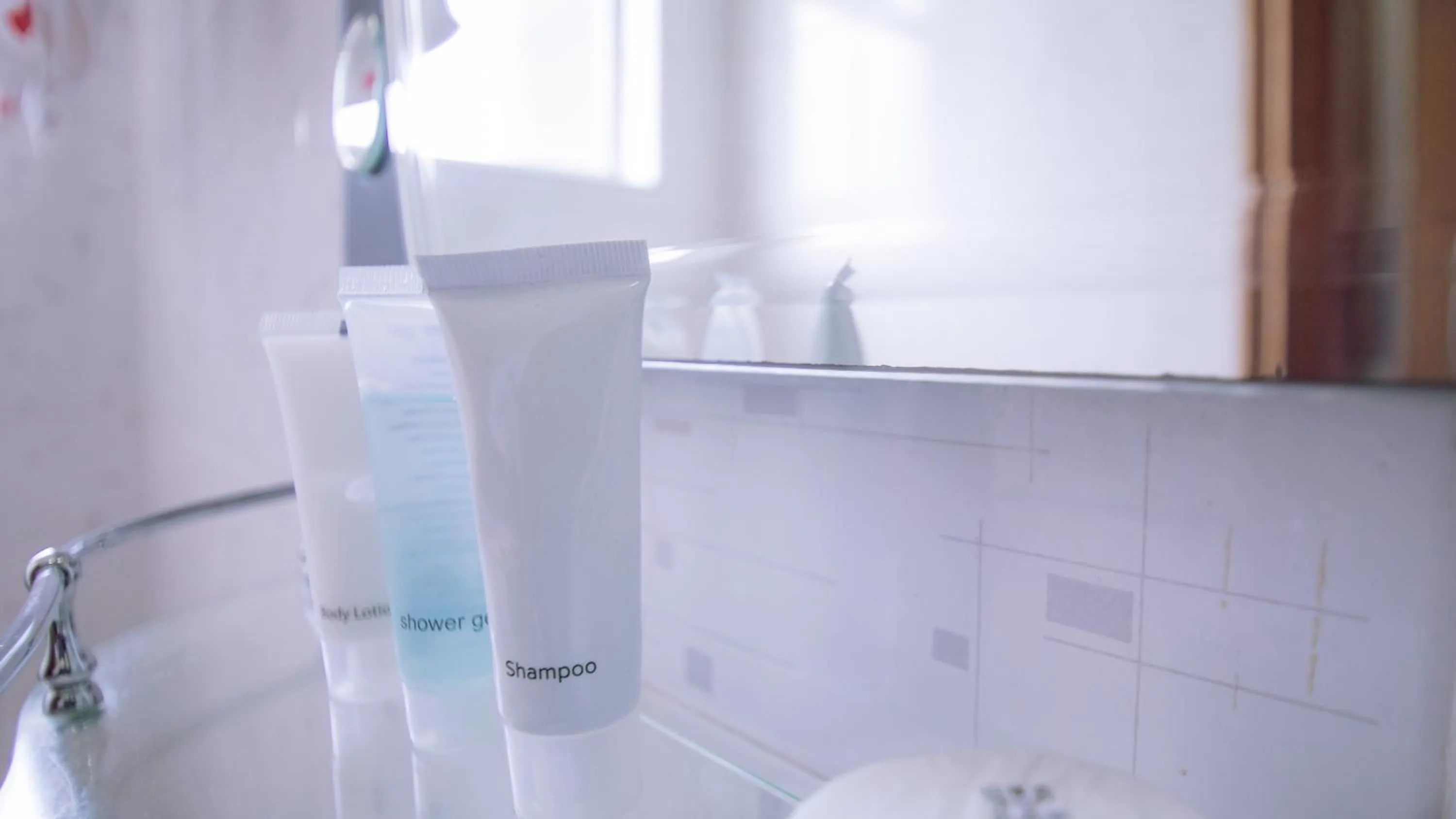 Bathroom in Longview Suites Hotel