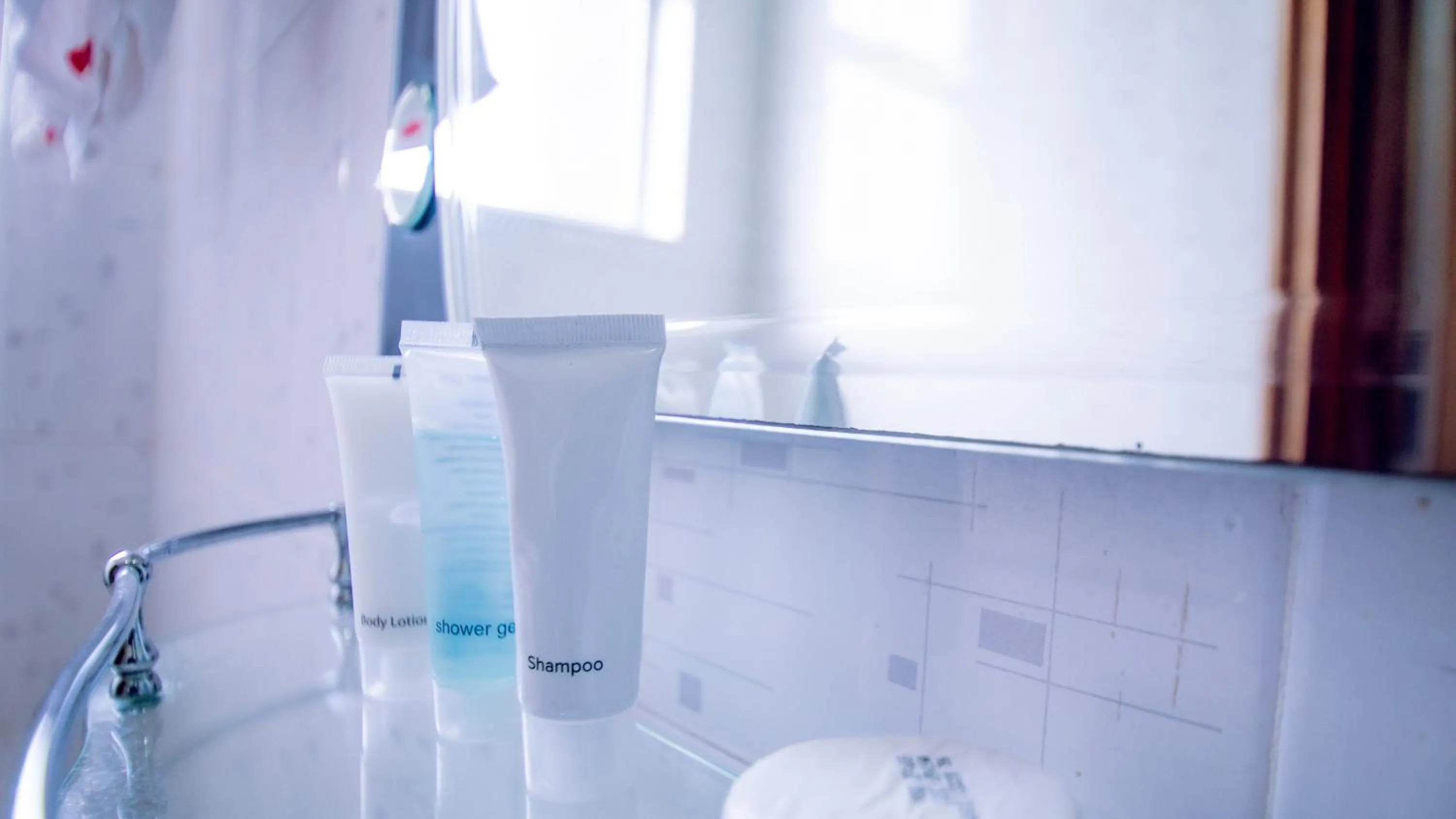Bathroom in Longview Suites Hotel