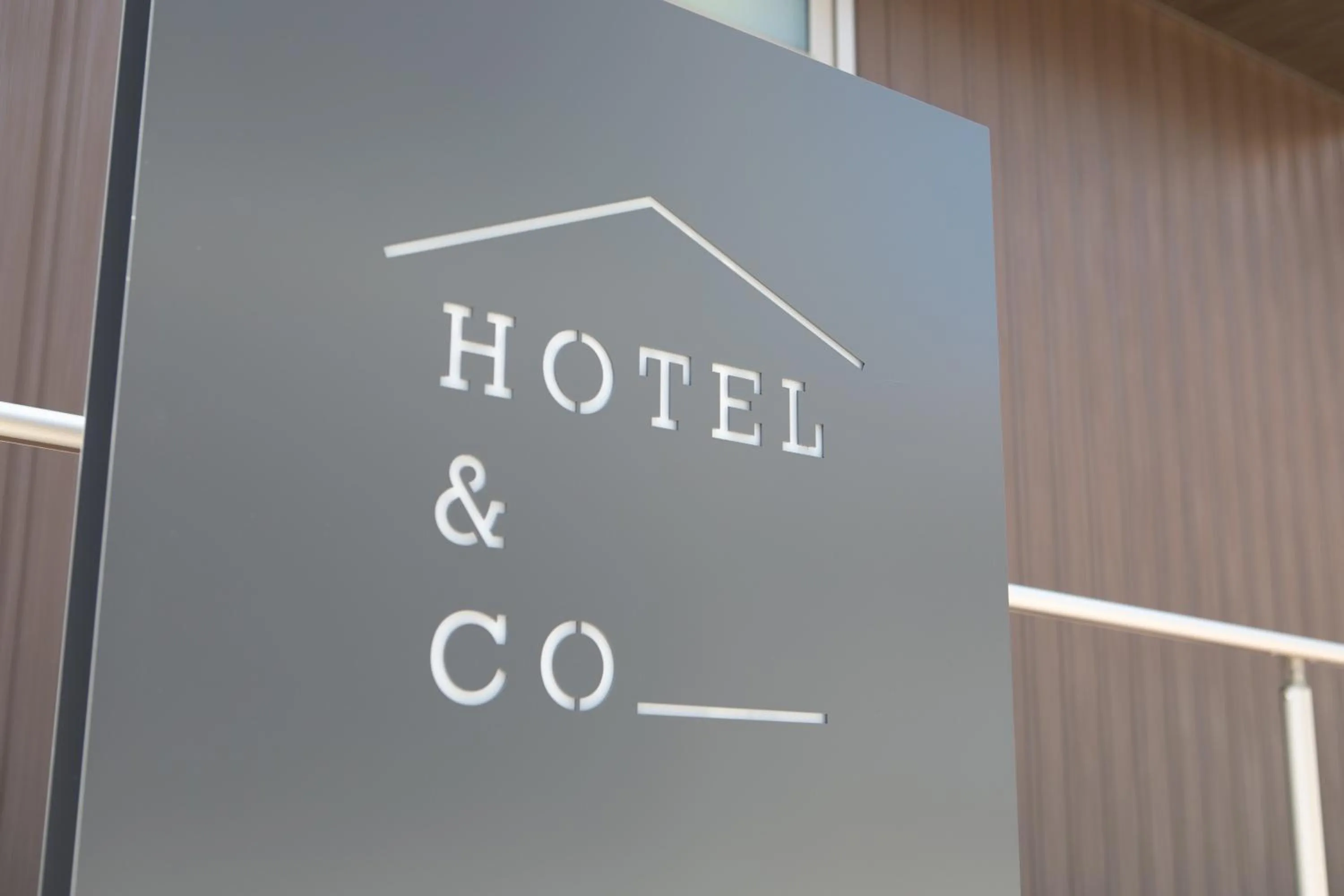 Property logo or sign in HOTEL&CO