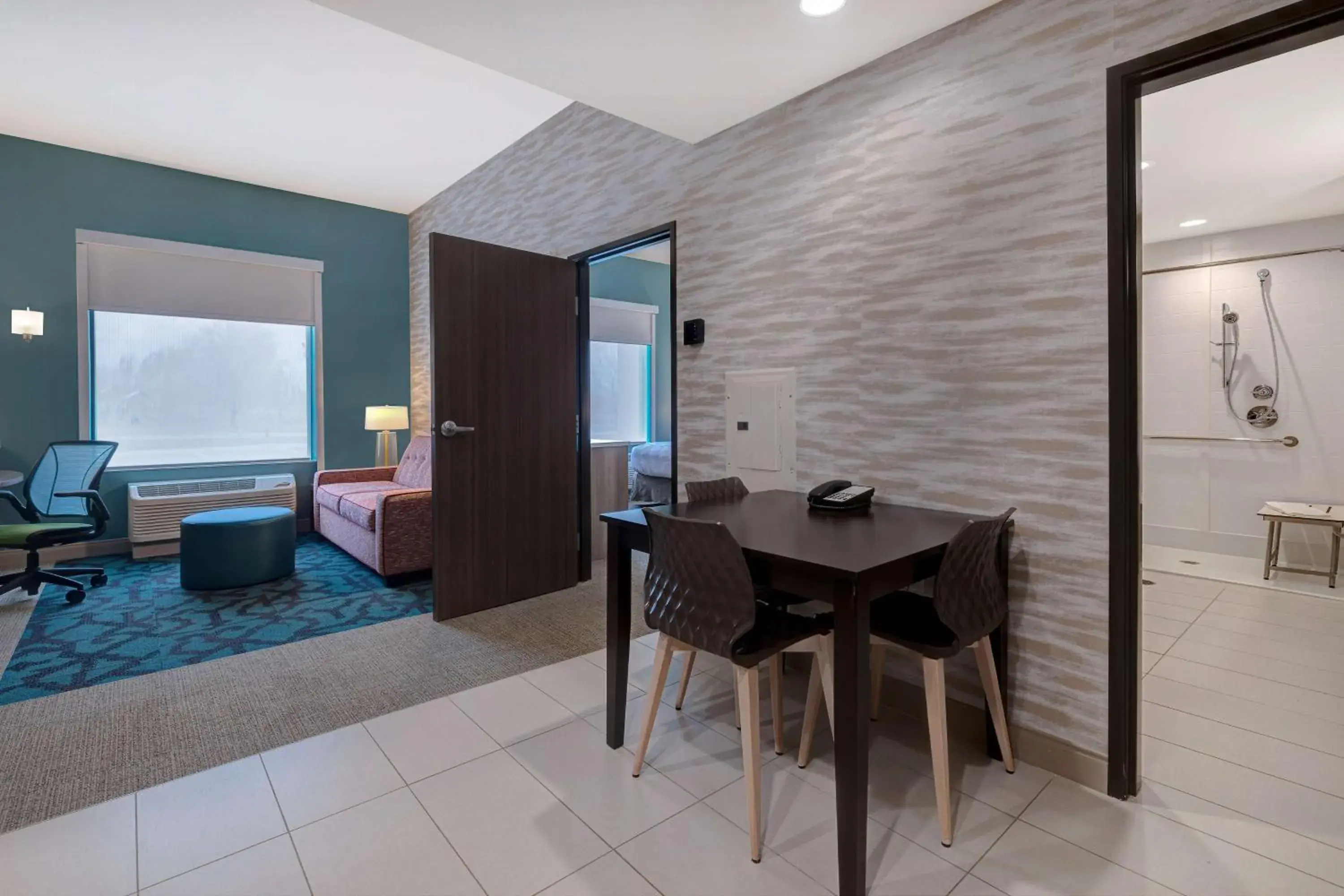 Living room in Home2 Suites By Hilton DeKalb Living room in Home2 Suites By Hilton DeKalb