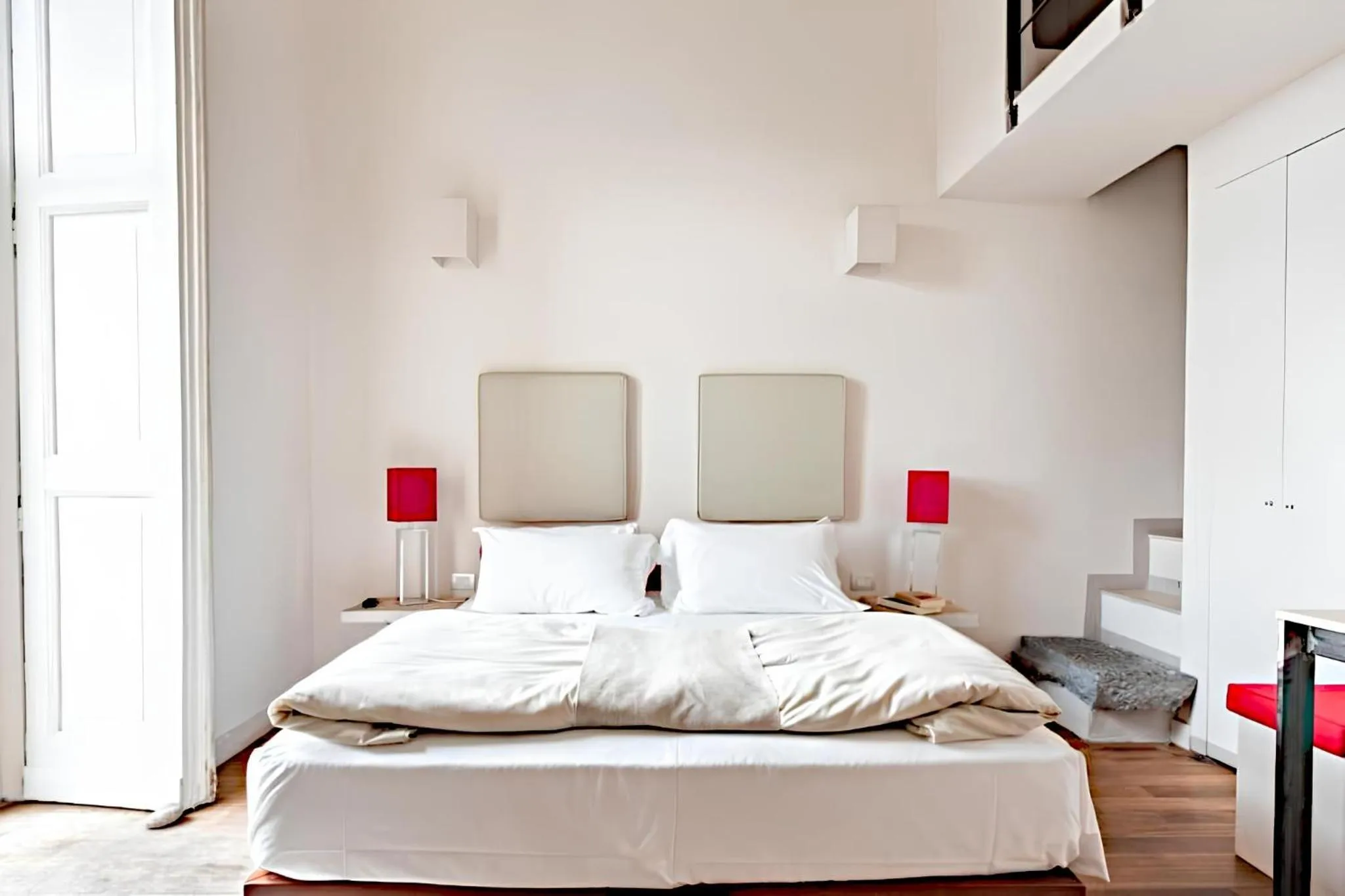 Bed in Micalò Art Rooms