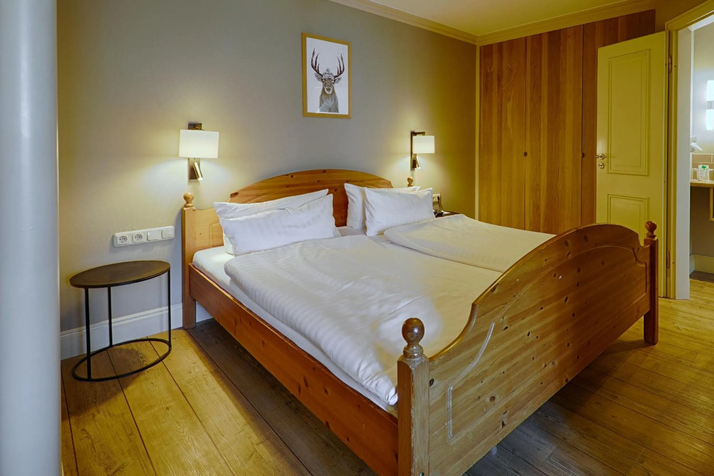 Photo of the whole room, Bed in Meeressterne Hotel Forsthaus Damerow