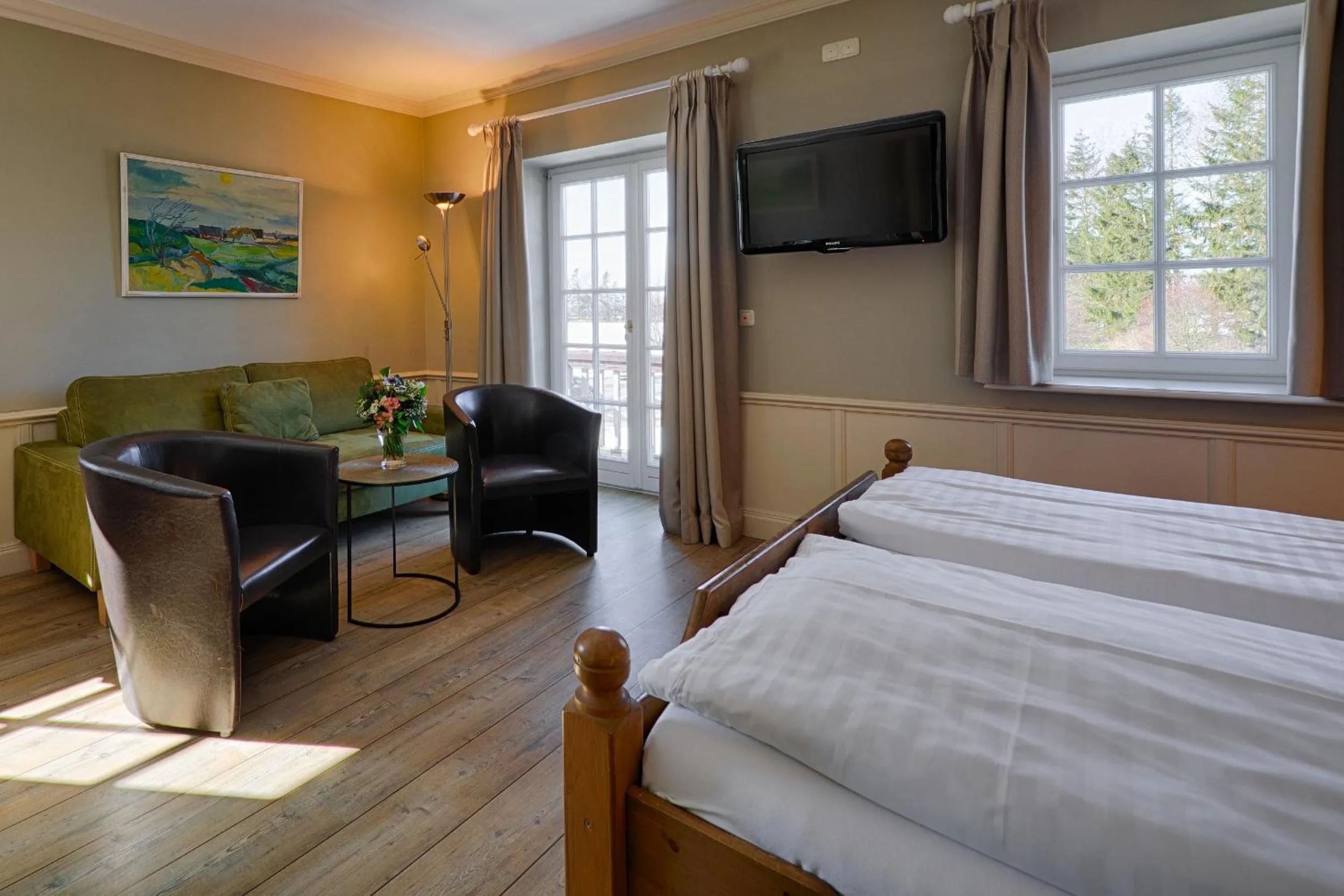 Photo of the whole room, Bed in Meeressterne Hotel Forsthaus Damerow