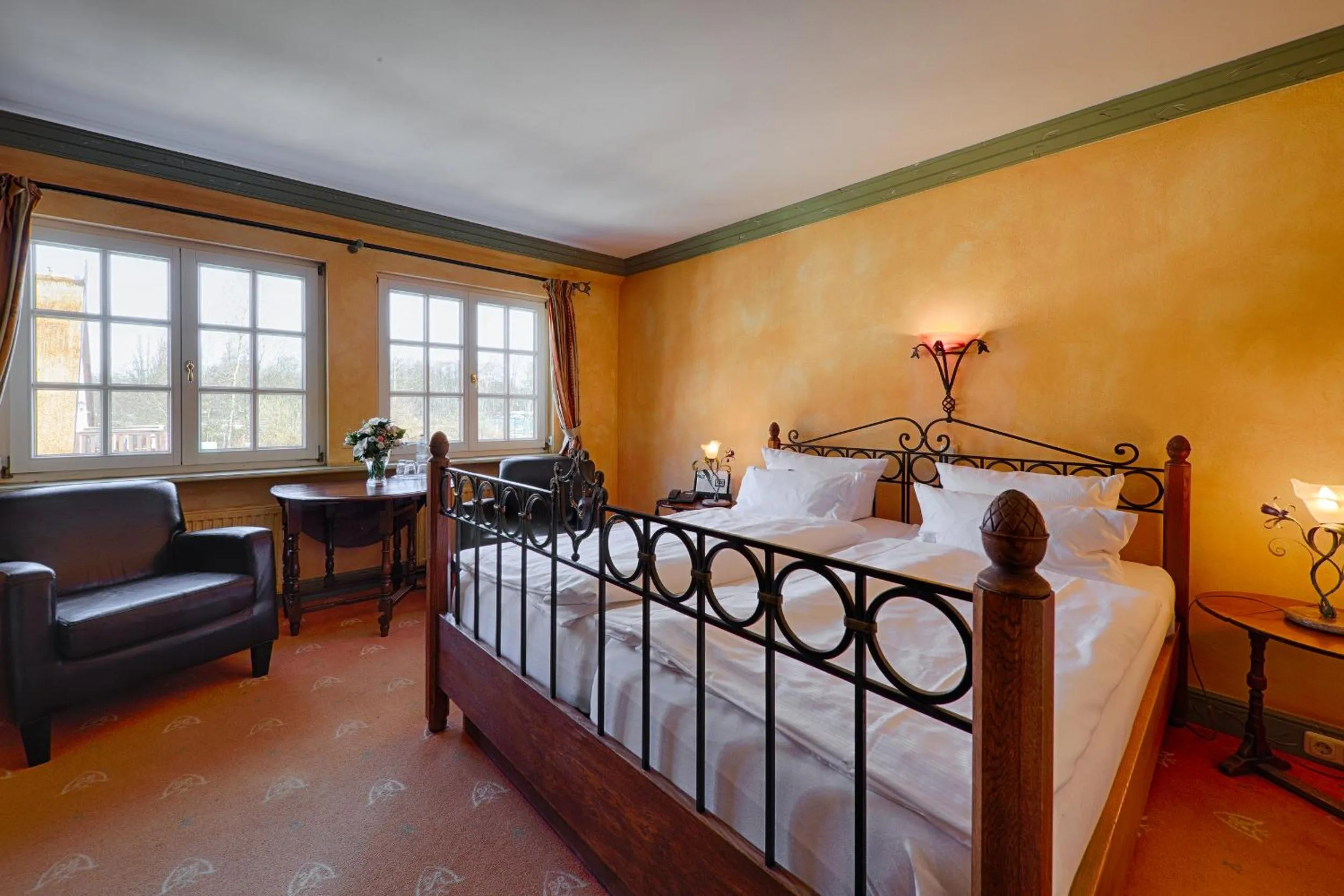 Photo of the whole room, Bed in Meeressterne Hotel Forsthaus Damerow