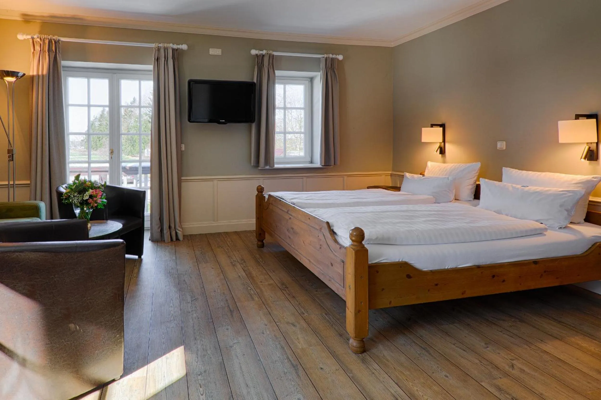 Photo of the whole room, Bed in Meeressterne Hotel Forsthaus Damerow