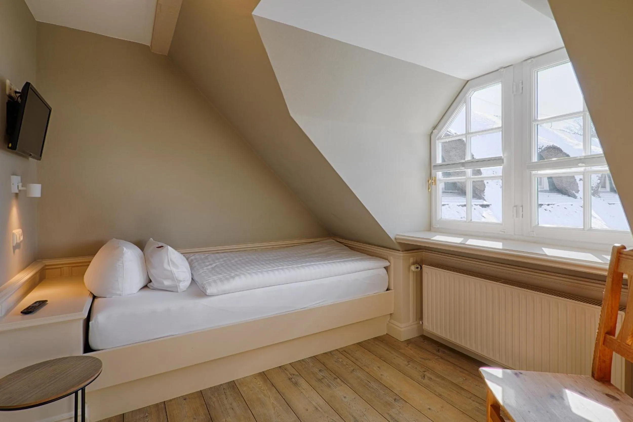 Photo of the whole room, Bed in Meeressterne Hotel Forsthaus Damerow