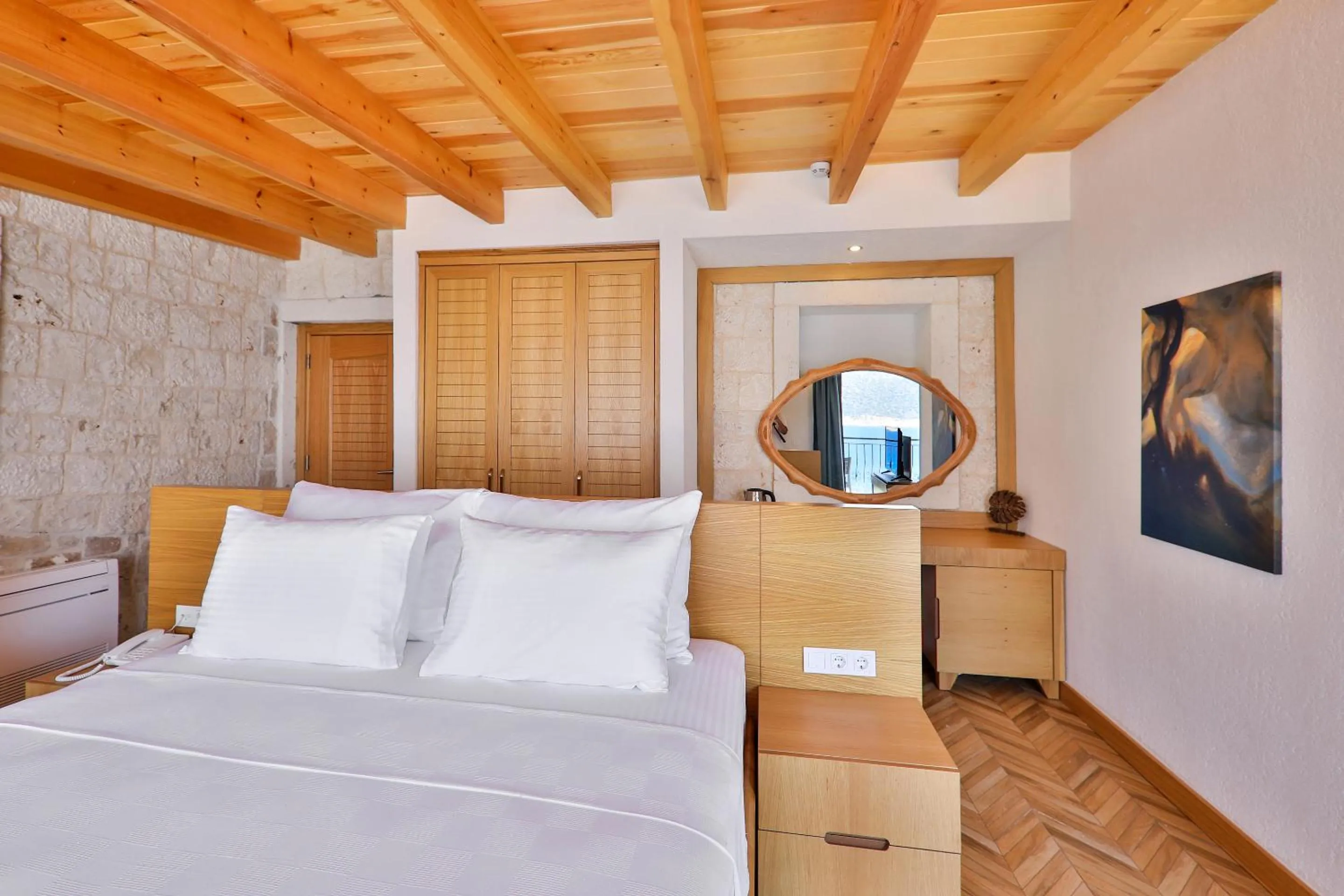 Bed in Atalante Hotel