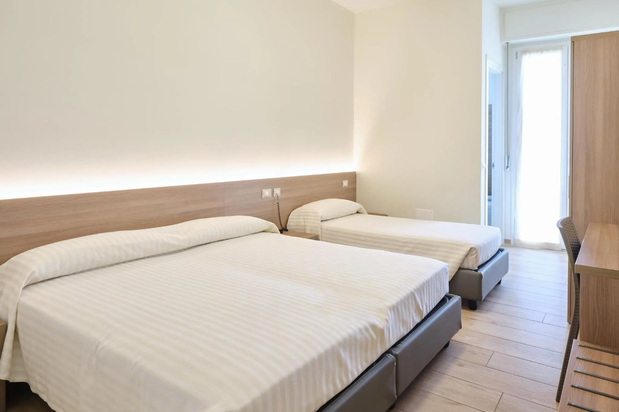 Bed in HOTELRISTORANTE IL PUNTO