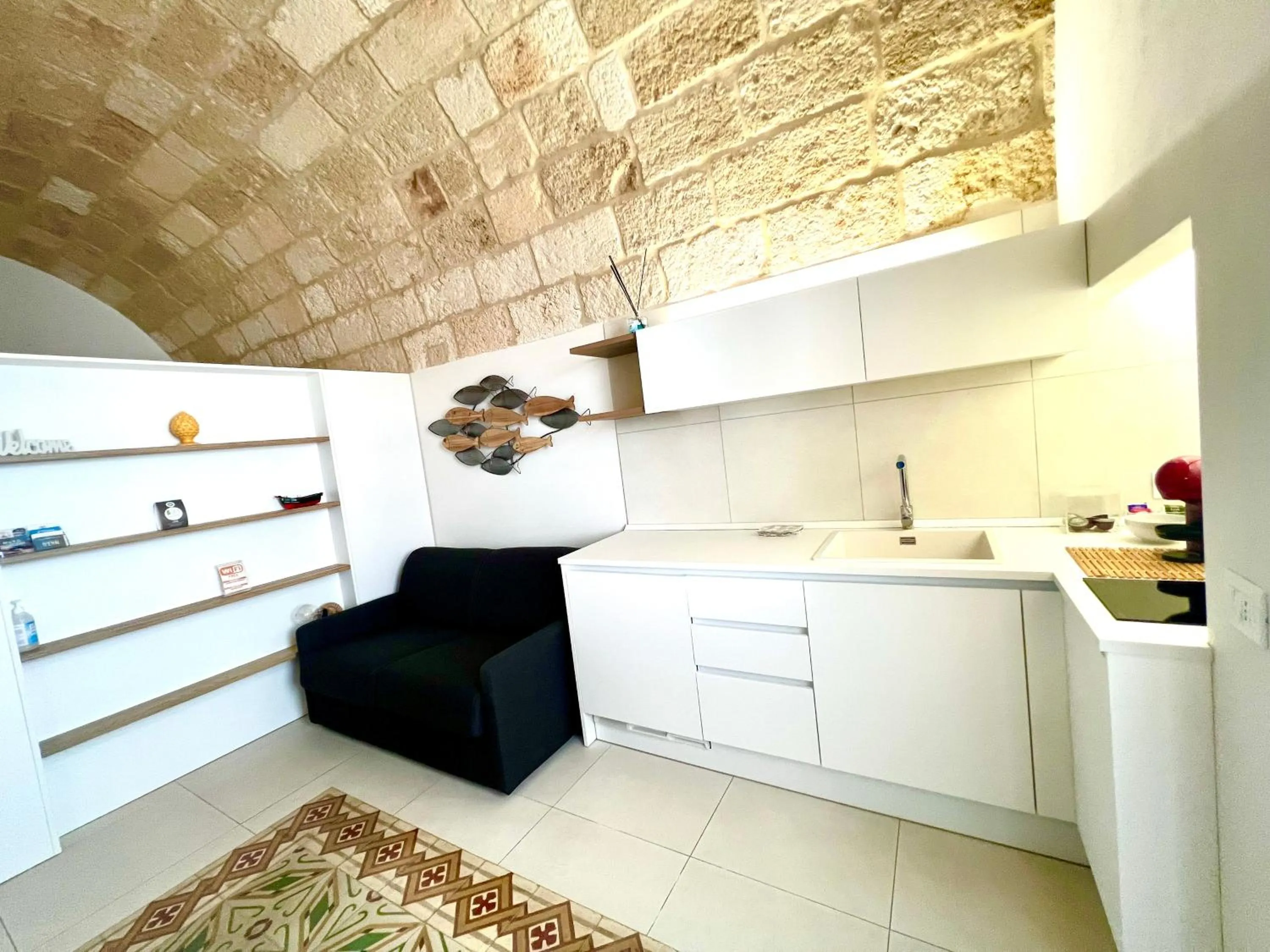 Kitchen or kitchenette in B&B Suite Amare Polignano