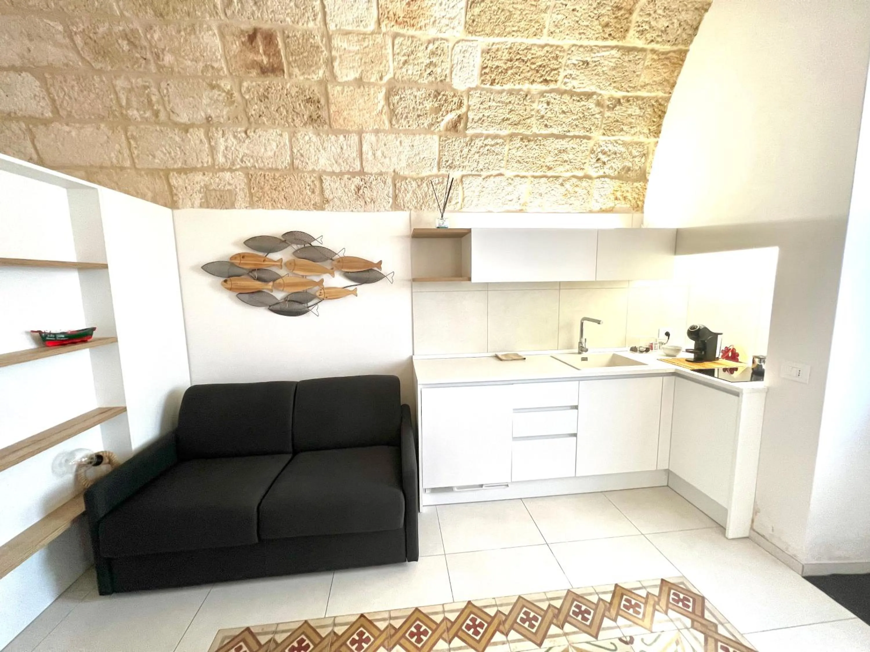 Kitchen or kitchenette in B&B Suite Amare Polignano