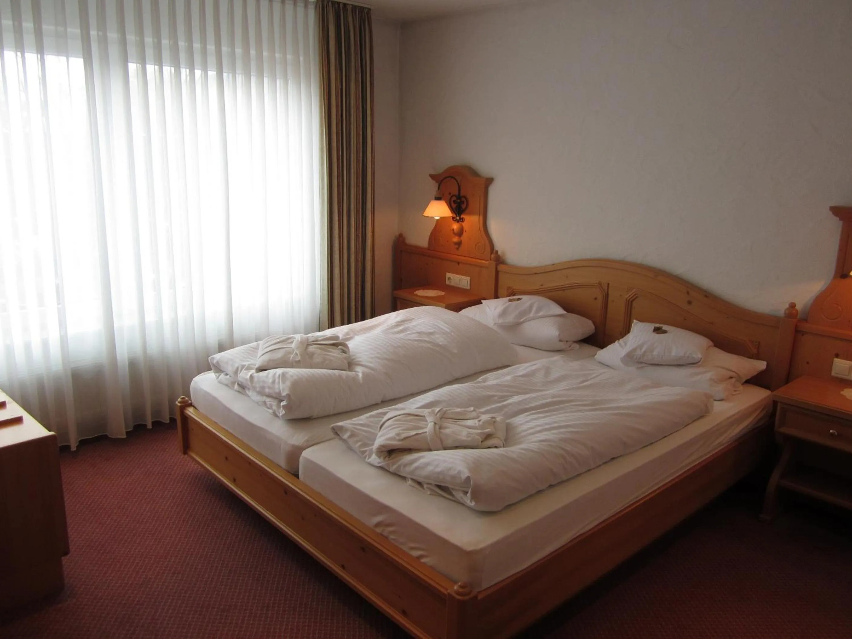 Bed in Wellnesshotel Bürgerstuben