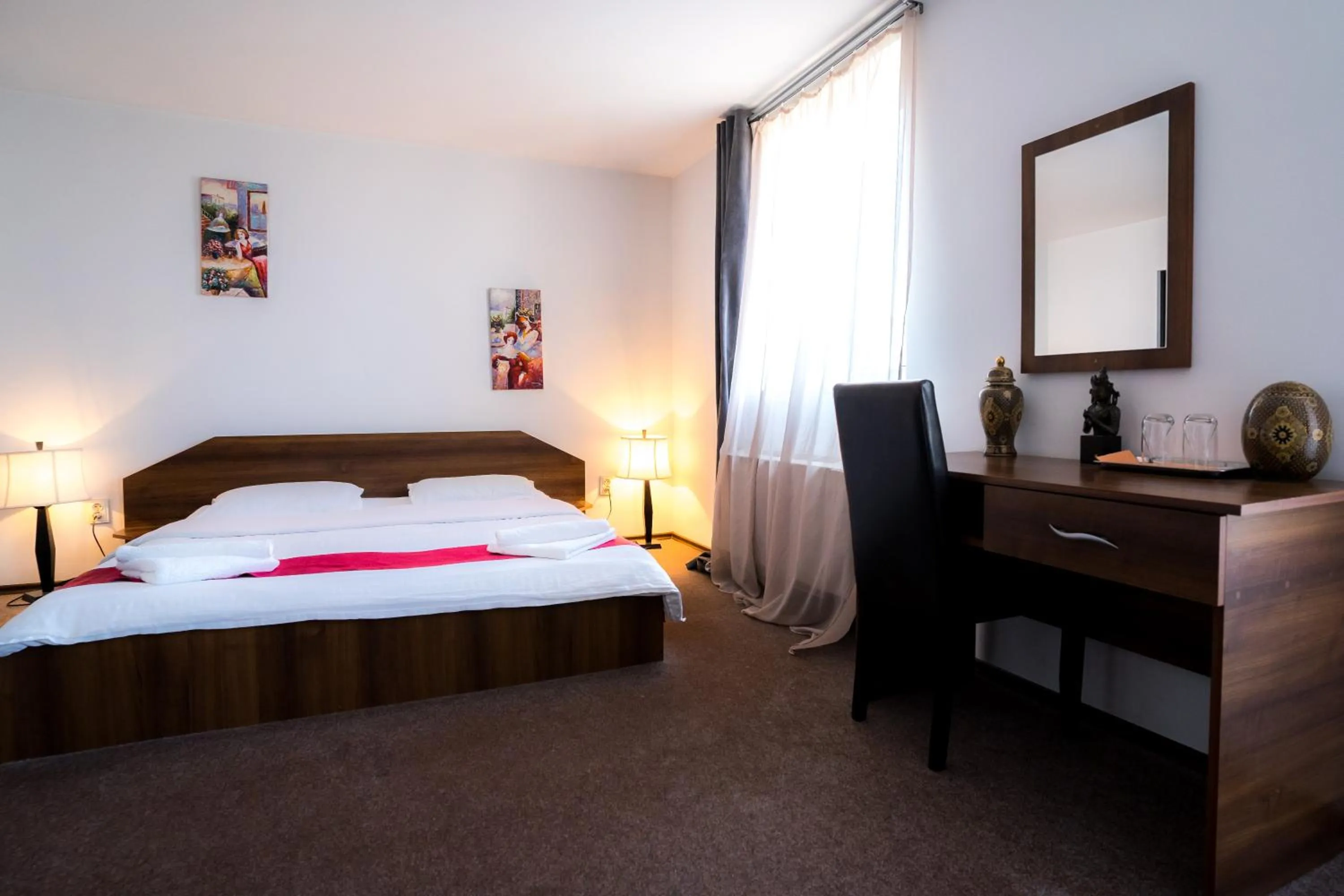 Bed in Pensiunea Dacia Deva