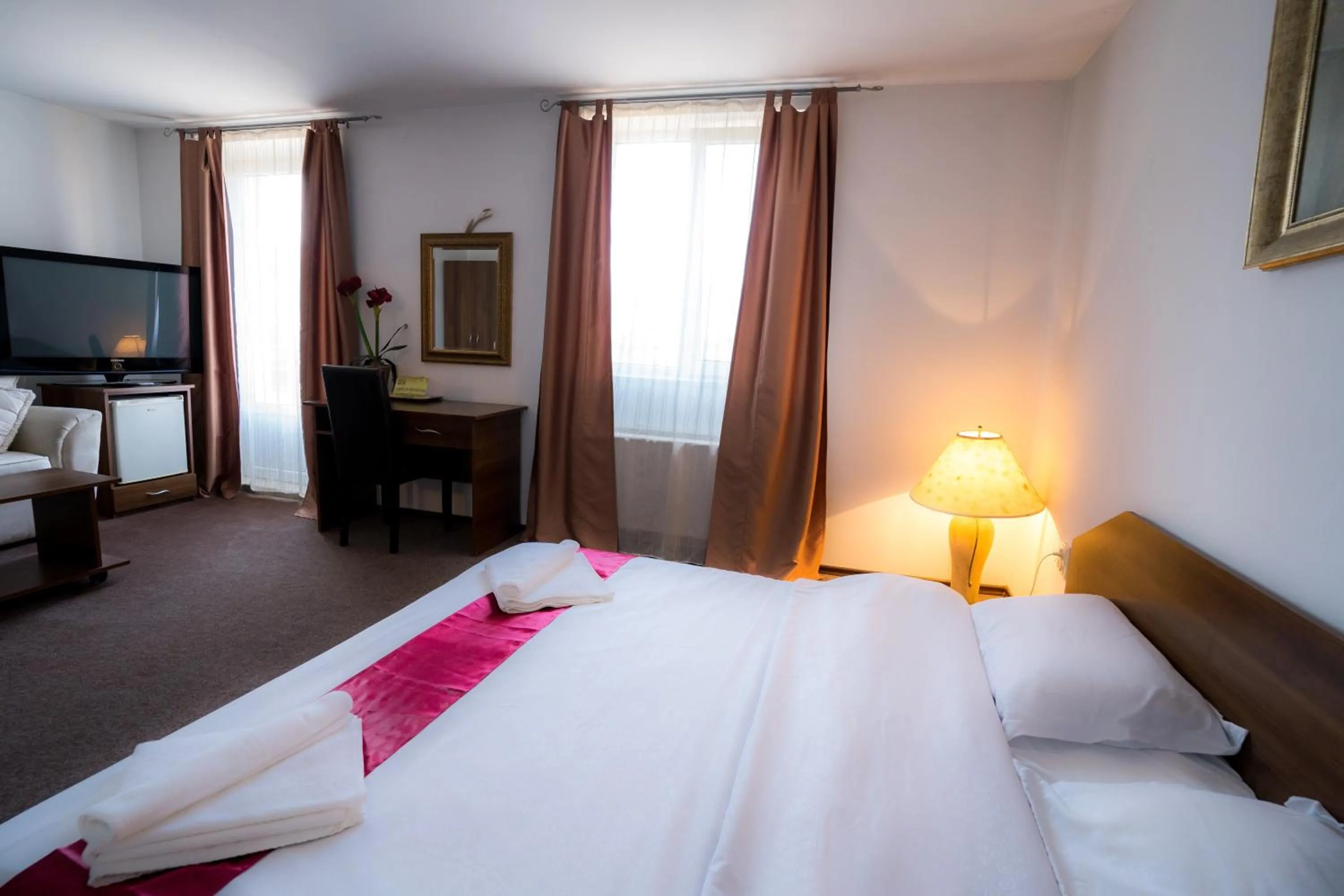 Bed in Pensiunea Dacia Deva