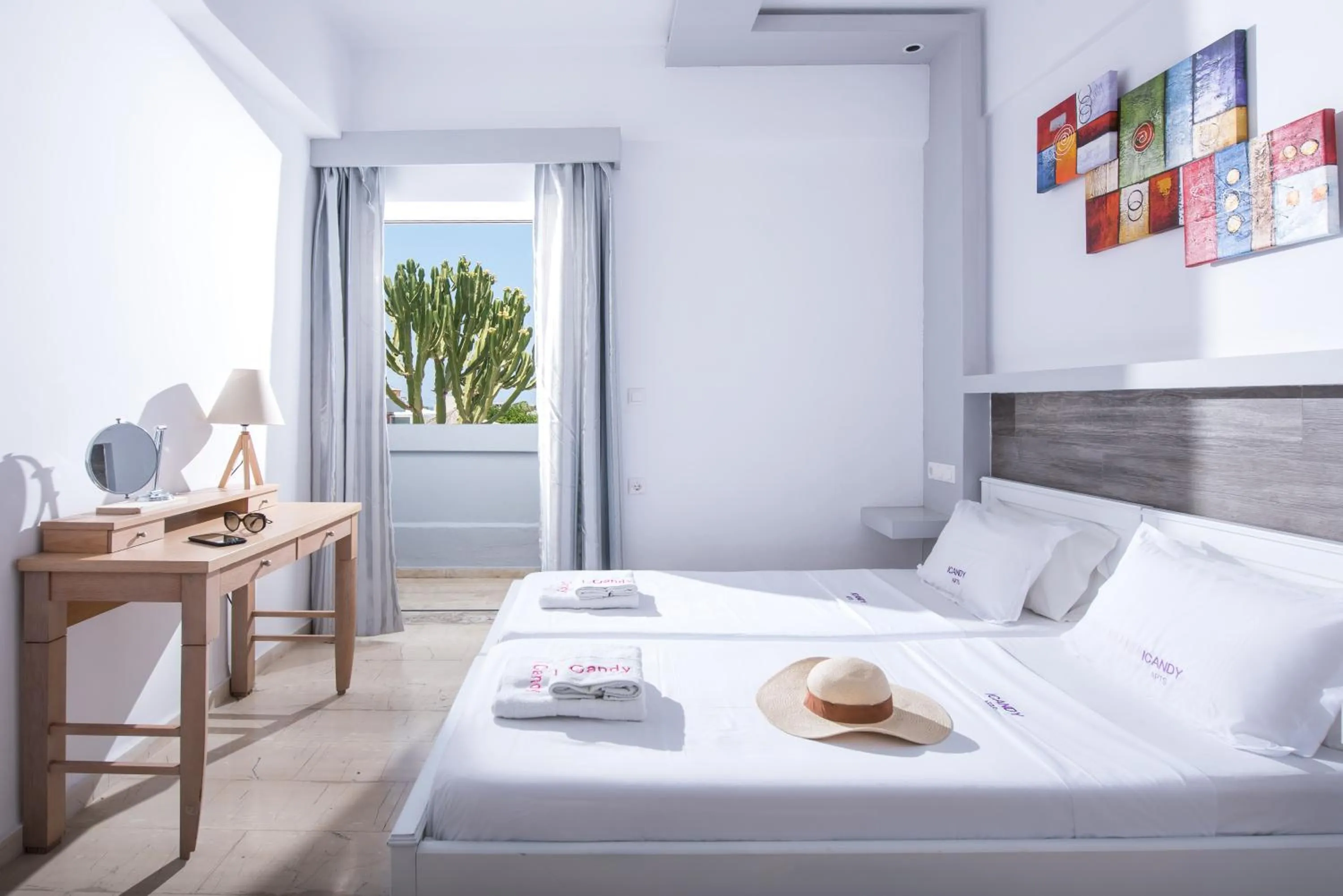 Photo of the whole room, Bed in I Candy Malia by Estia