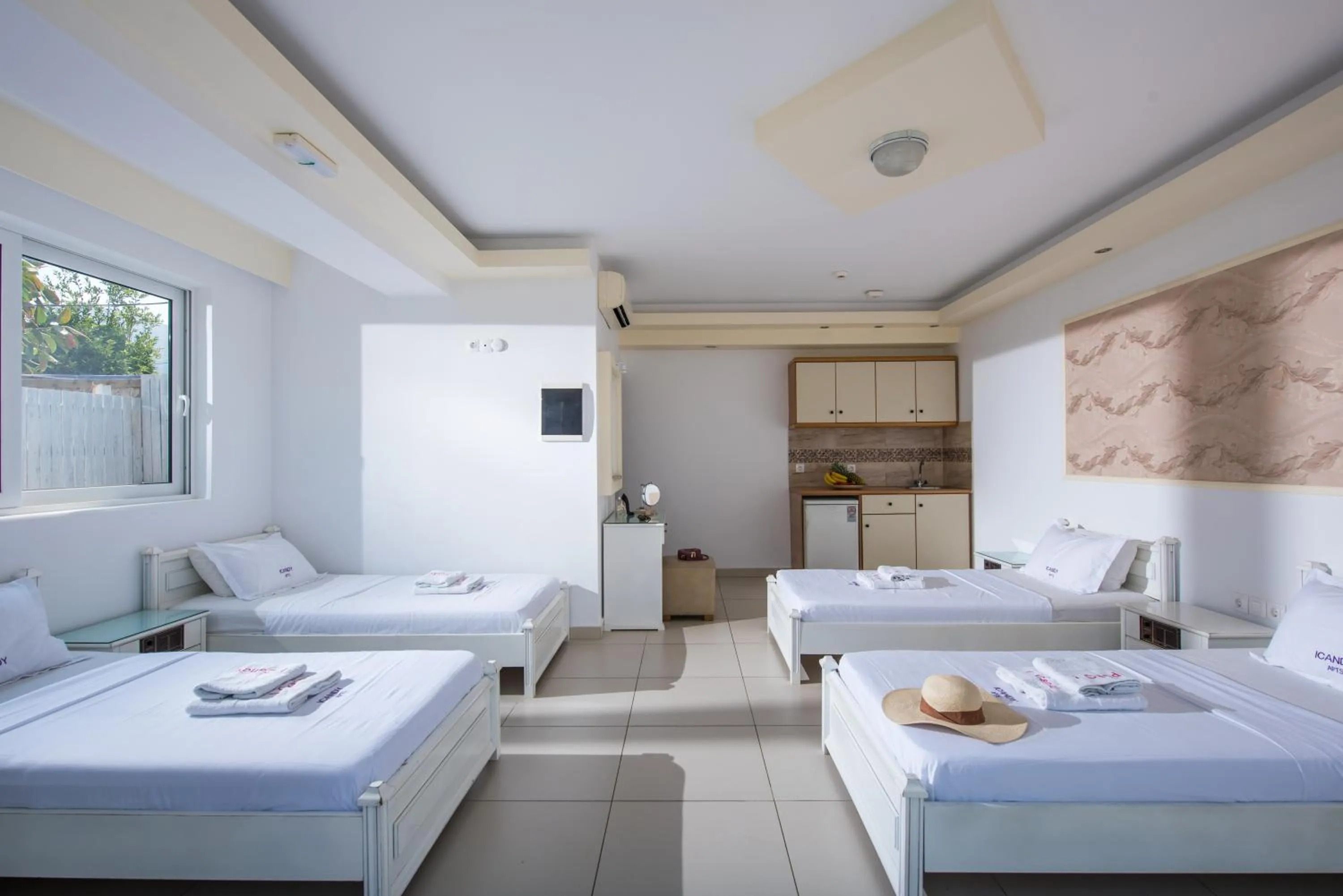 Photo of the whole room, Bed in I Candy Malia by Estia