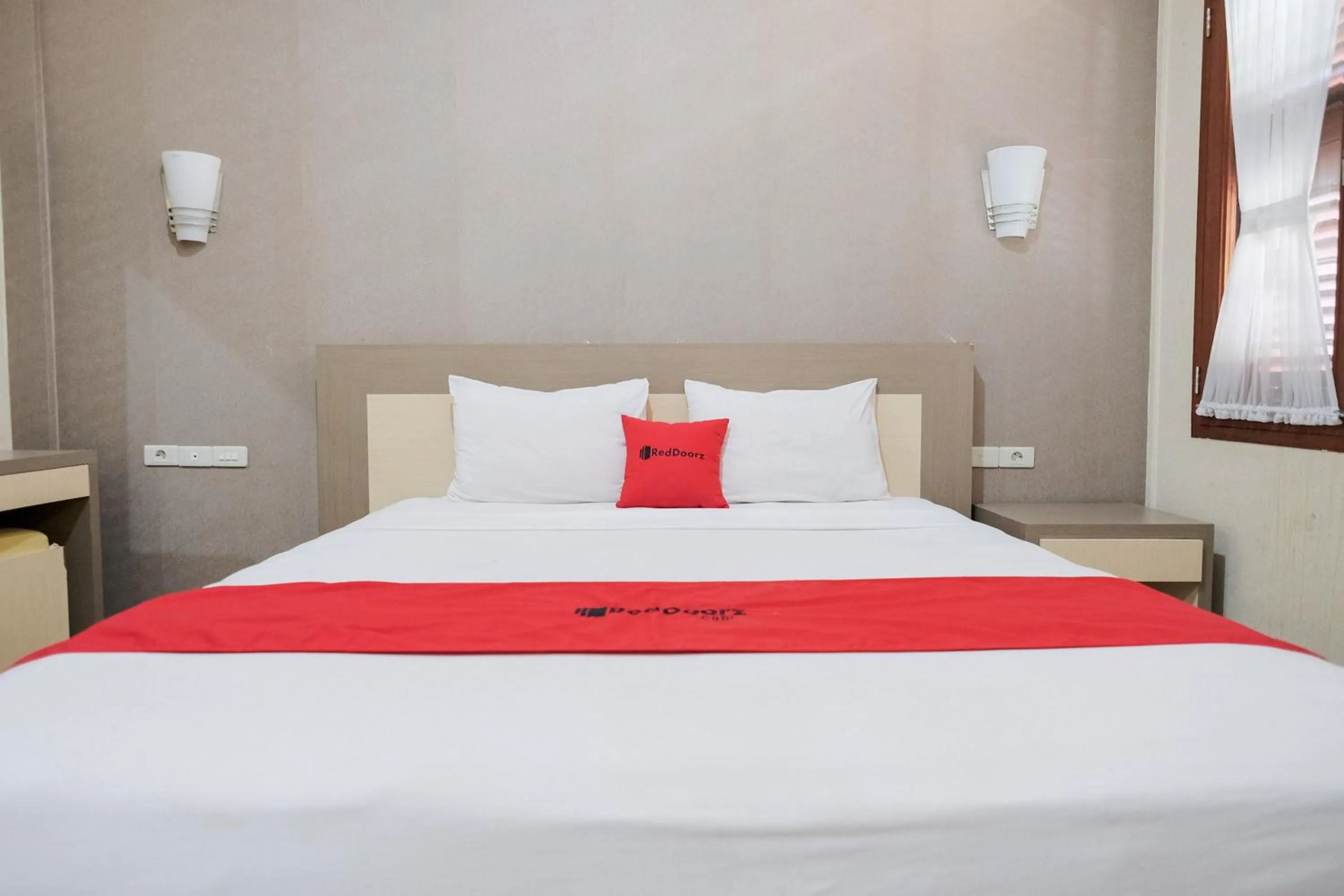 Bed in RedDoorz at Hotel Negeri Baru Kalianda Lampung