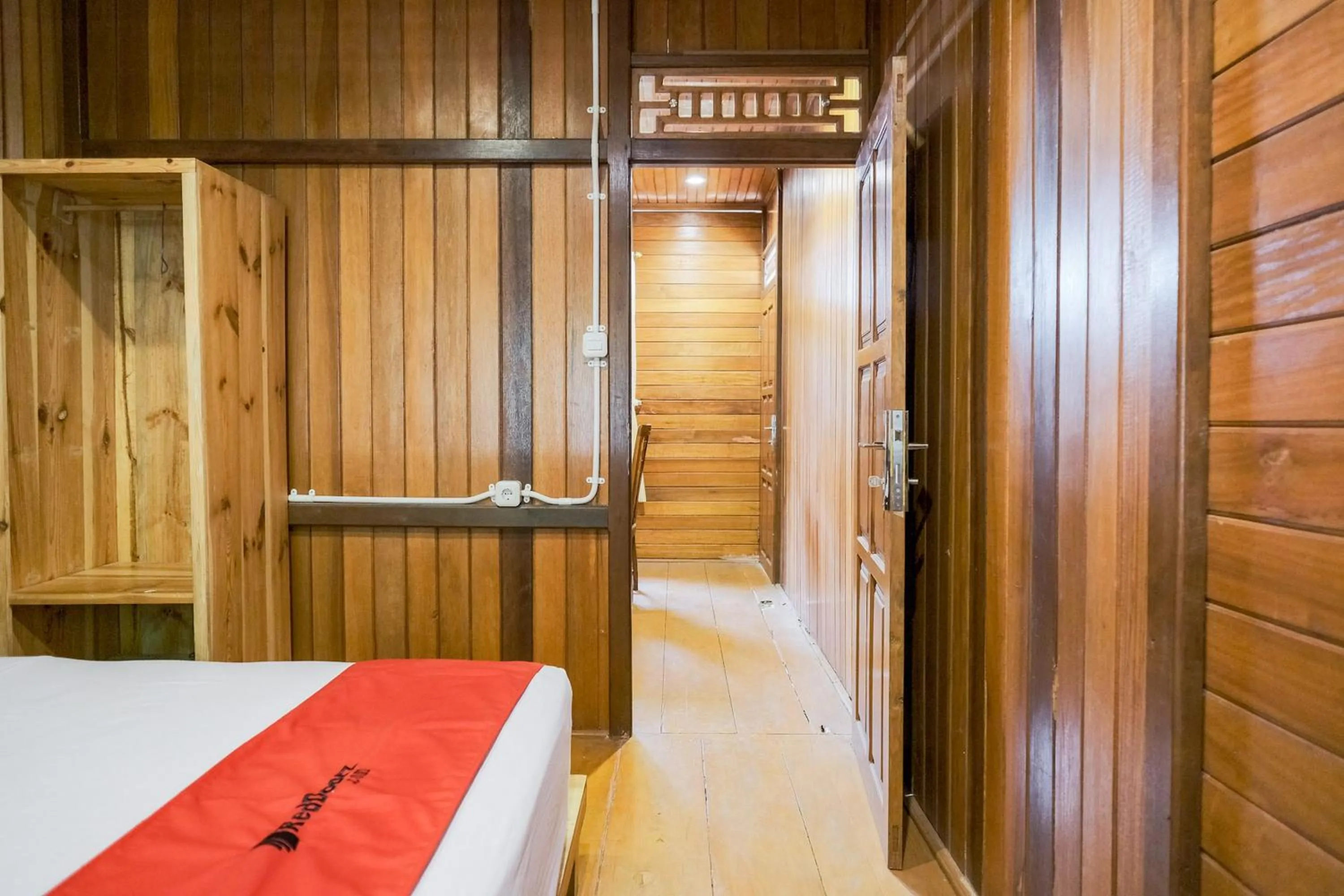 Bed in RedDoorz at Hotel Negeri Baru Kalianda Lampung