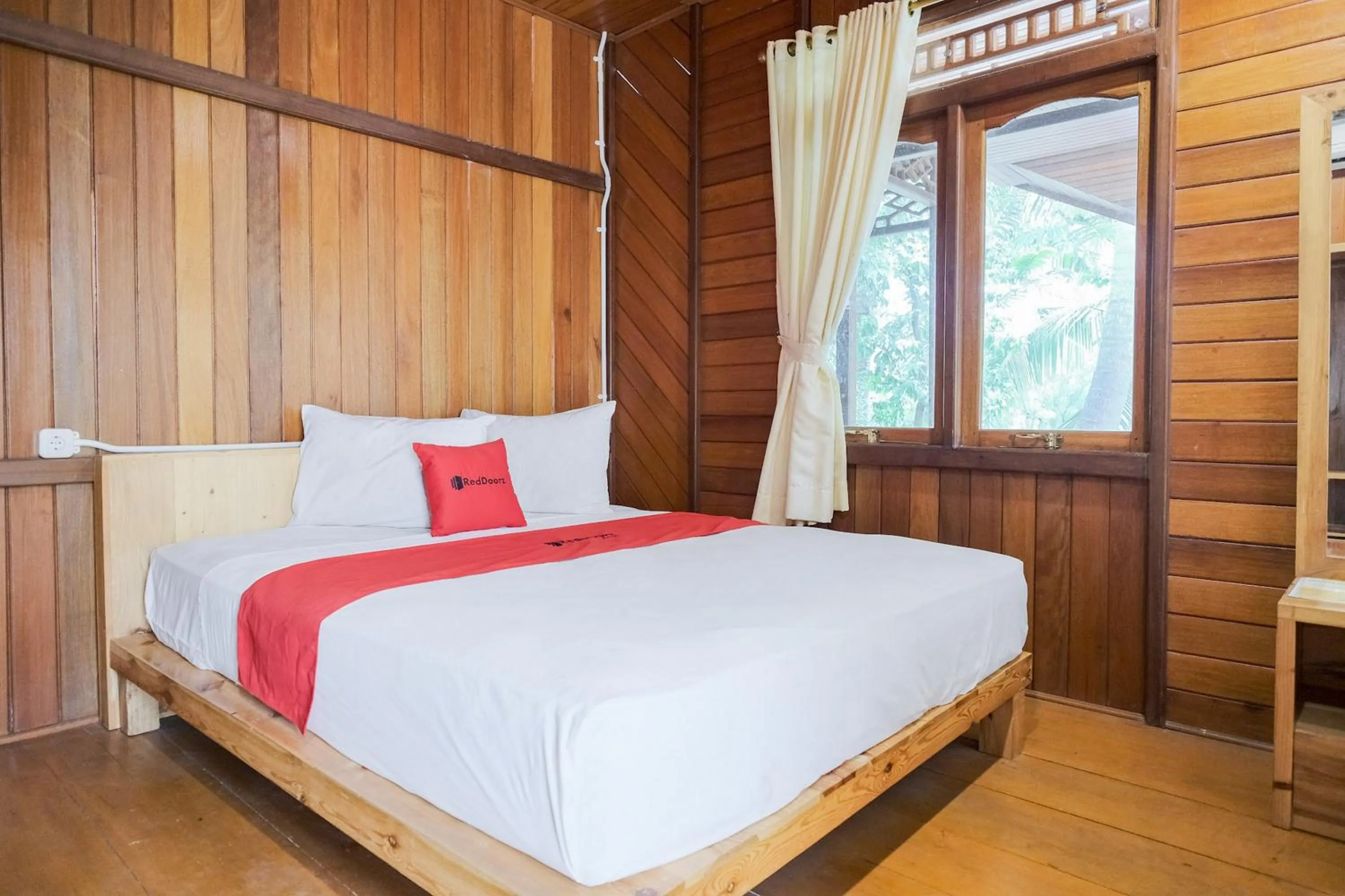 Bed in RedDoorz at Hotel Negeri Baru Kalianda Lampung