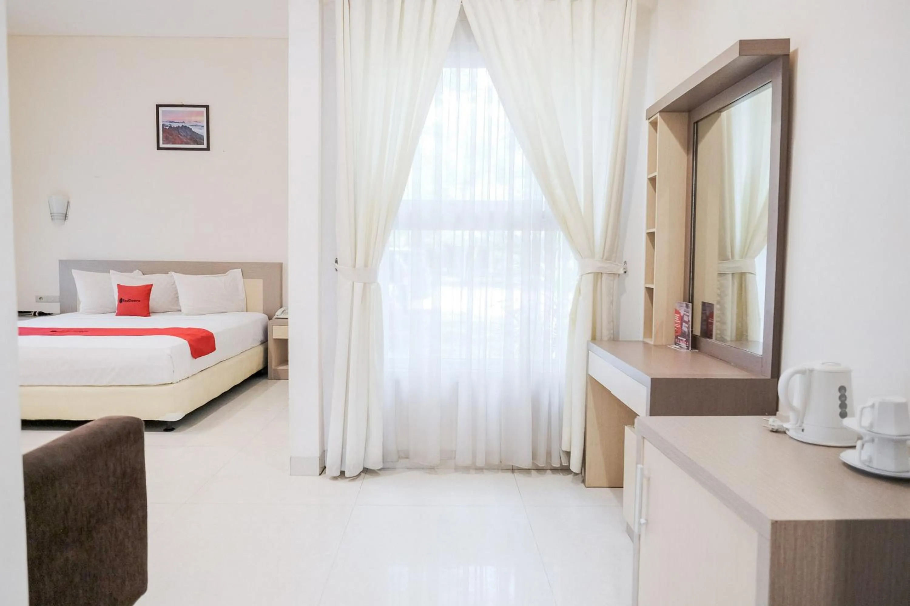 Bed in RedDoorz at Hotel Negeri Baru Kalianda Lampung