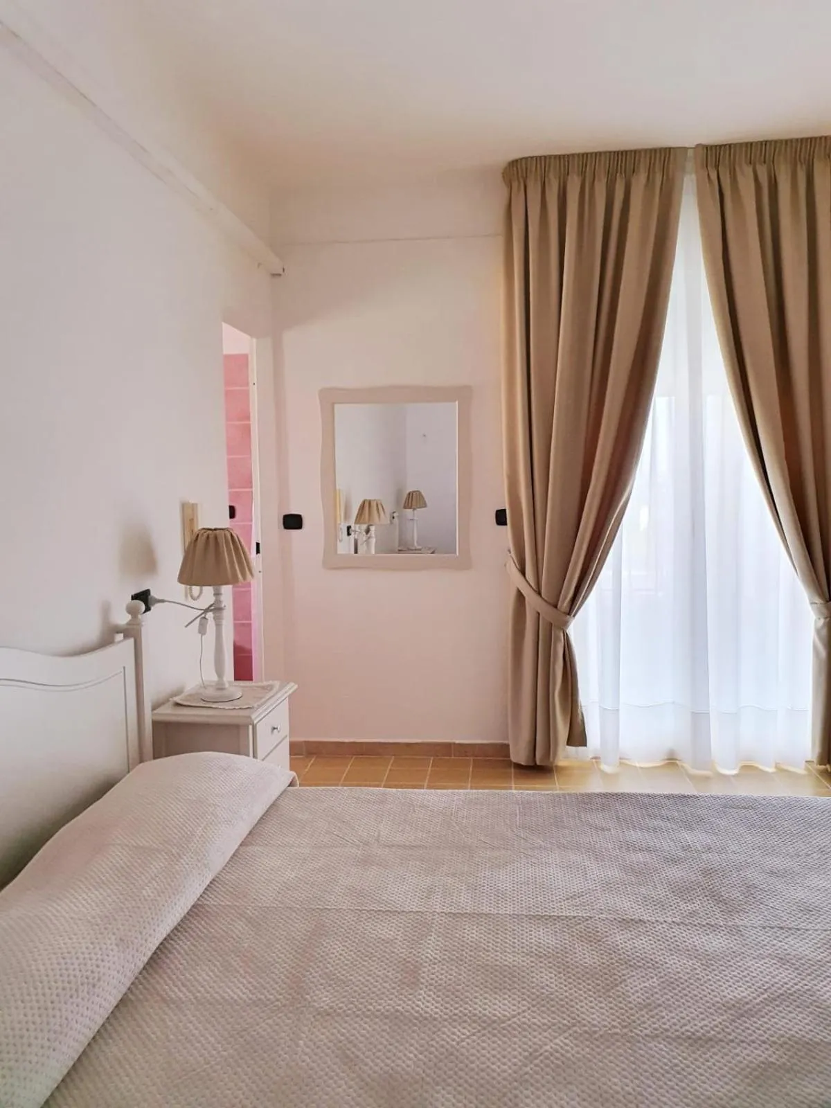 Photo of the whole room, Bed in L'attico b&b