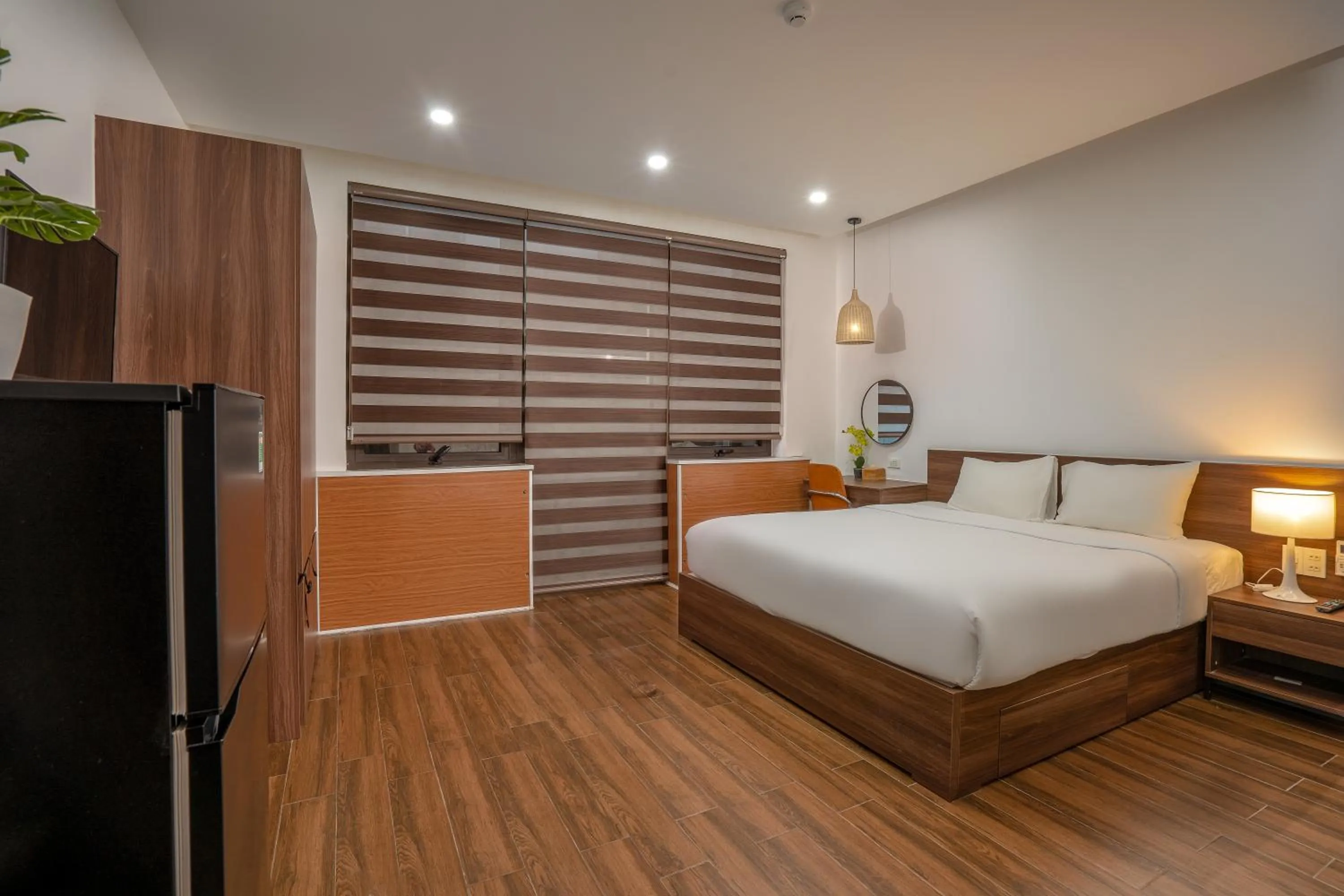 Bed in Dragon View Riverfront Hotel