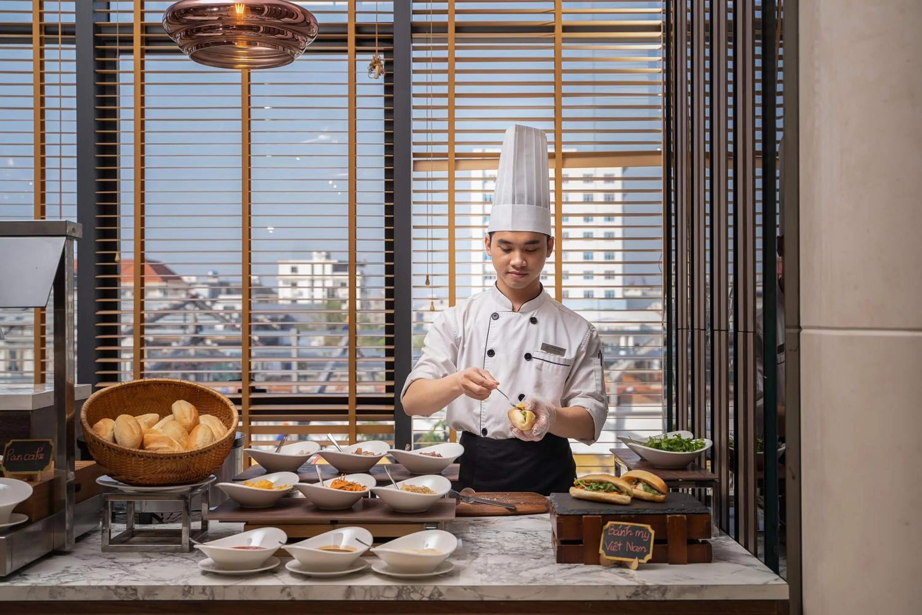 Staff in DeLaSea Ha Long Hotel - Modern Bayview Escape