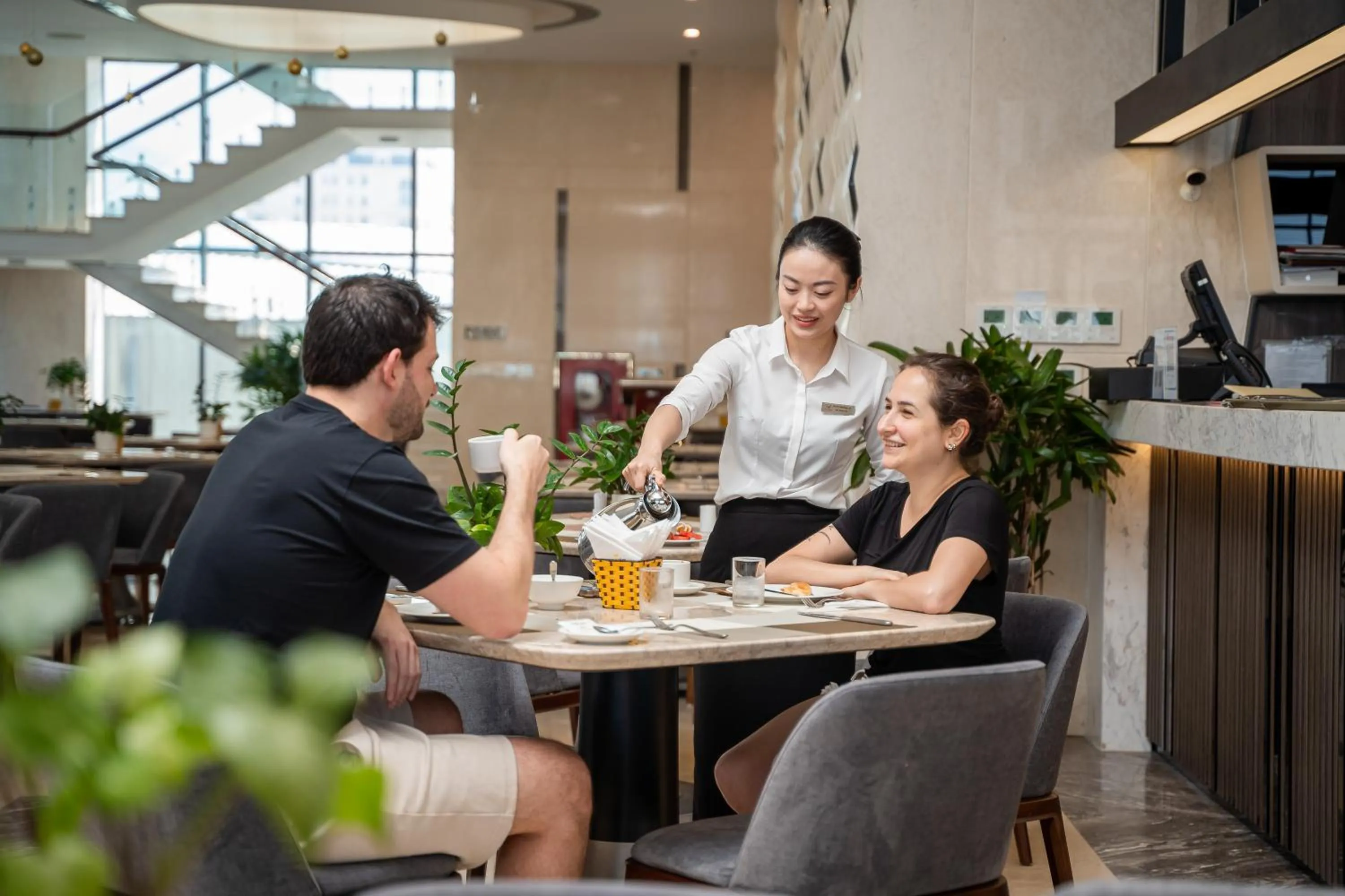 Staff in DeLaSea Ha Long Hotel - Modern Bayview Escape