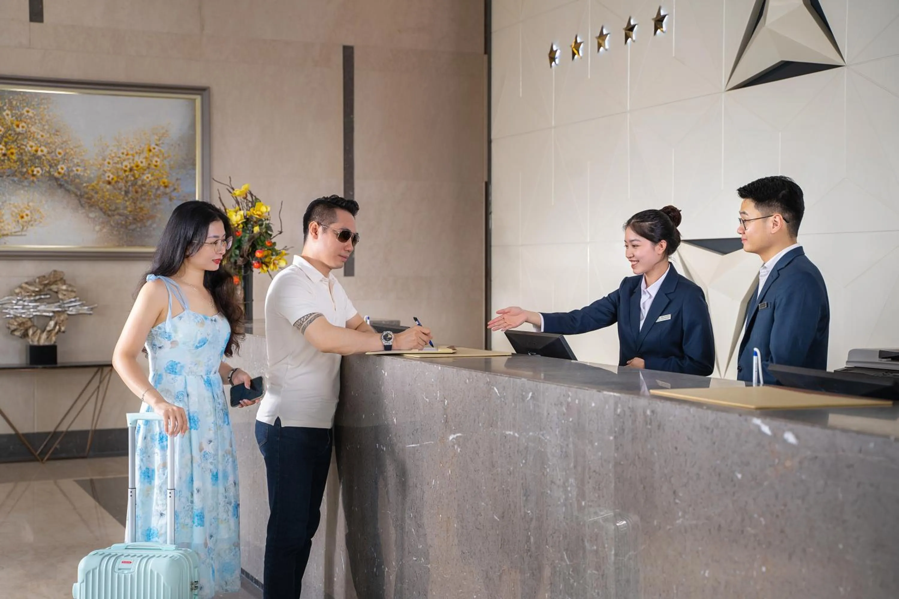 Staff in DeLaSea Ha Long Hotel - Modern Bayview Escape