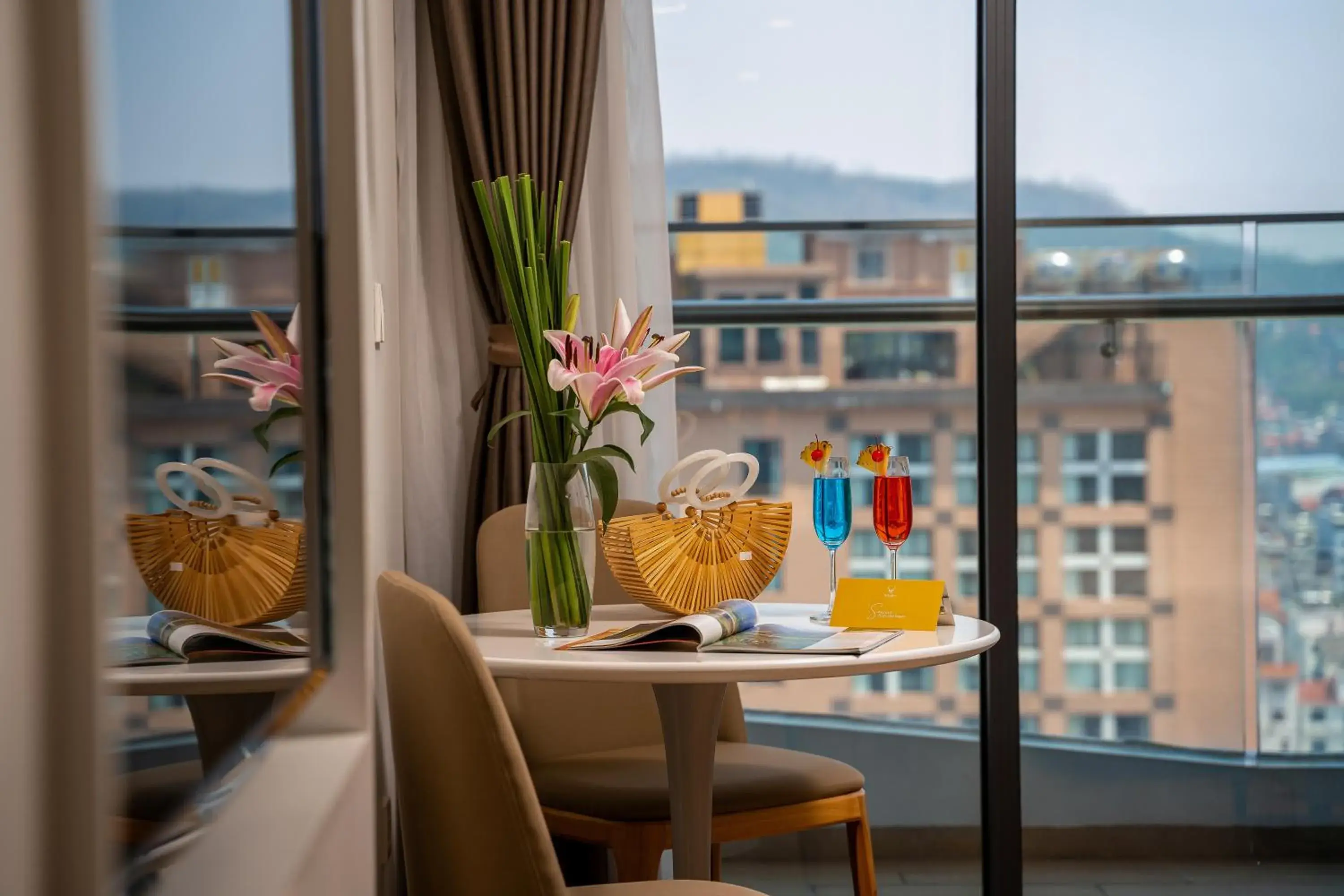 Deluxe City View King Bed With Balcony in DeLaSea Ha Long Hotel - Modern Bayview Escape Deluxe City View King Bed With Balcony in DeLaSea Ha Long Hotel - Modern Bayview Escape
