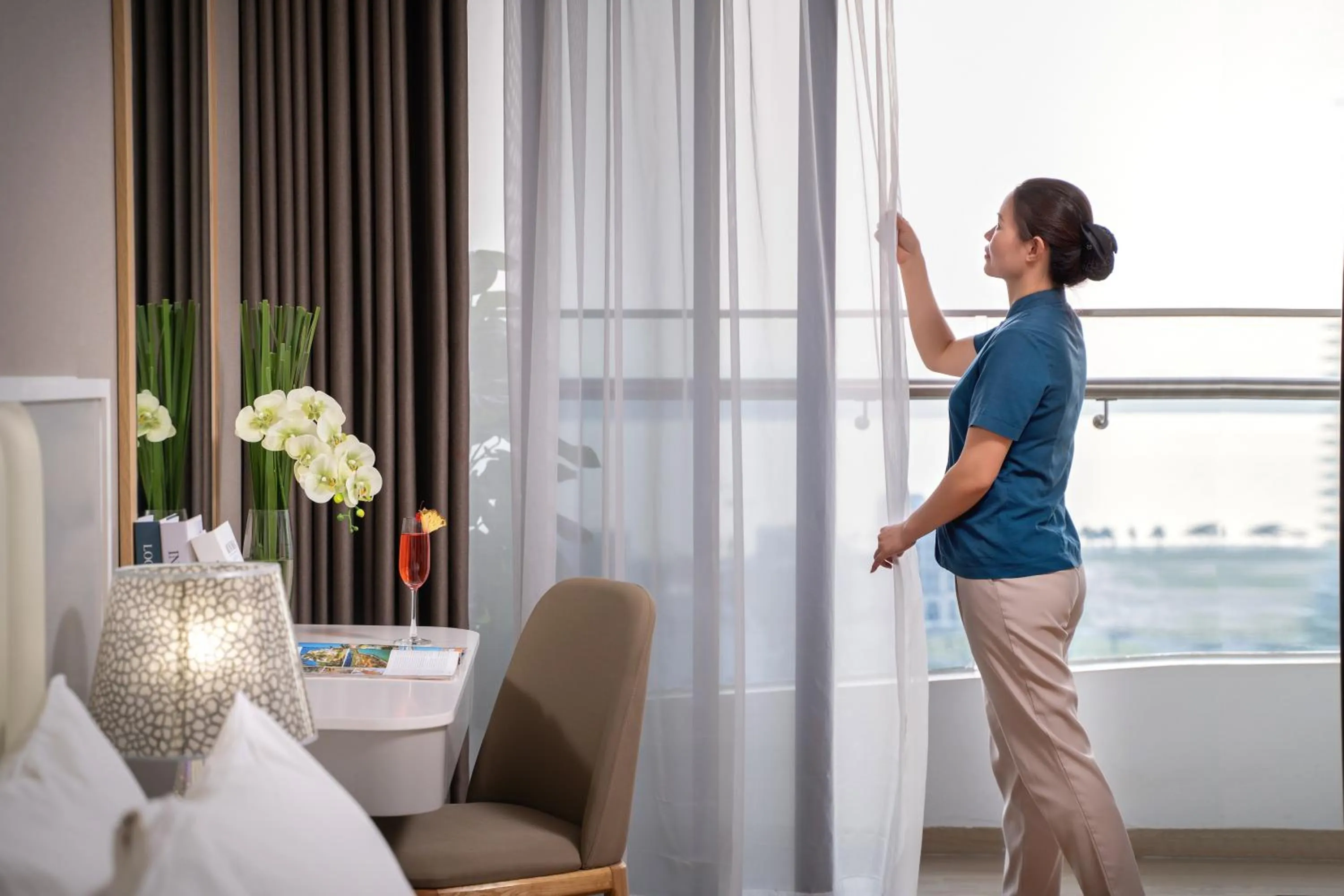 Staff in DeLaSea Ha Long Hotel - Modern Bayview Escape