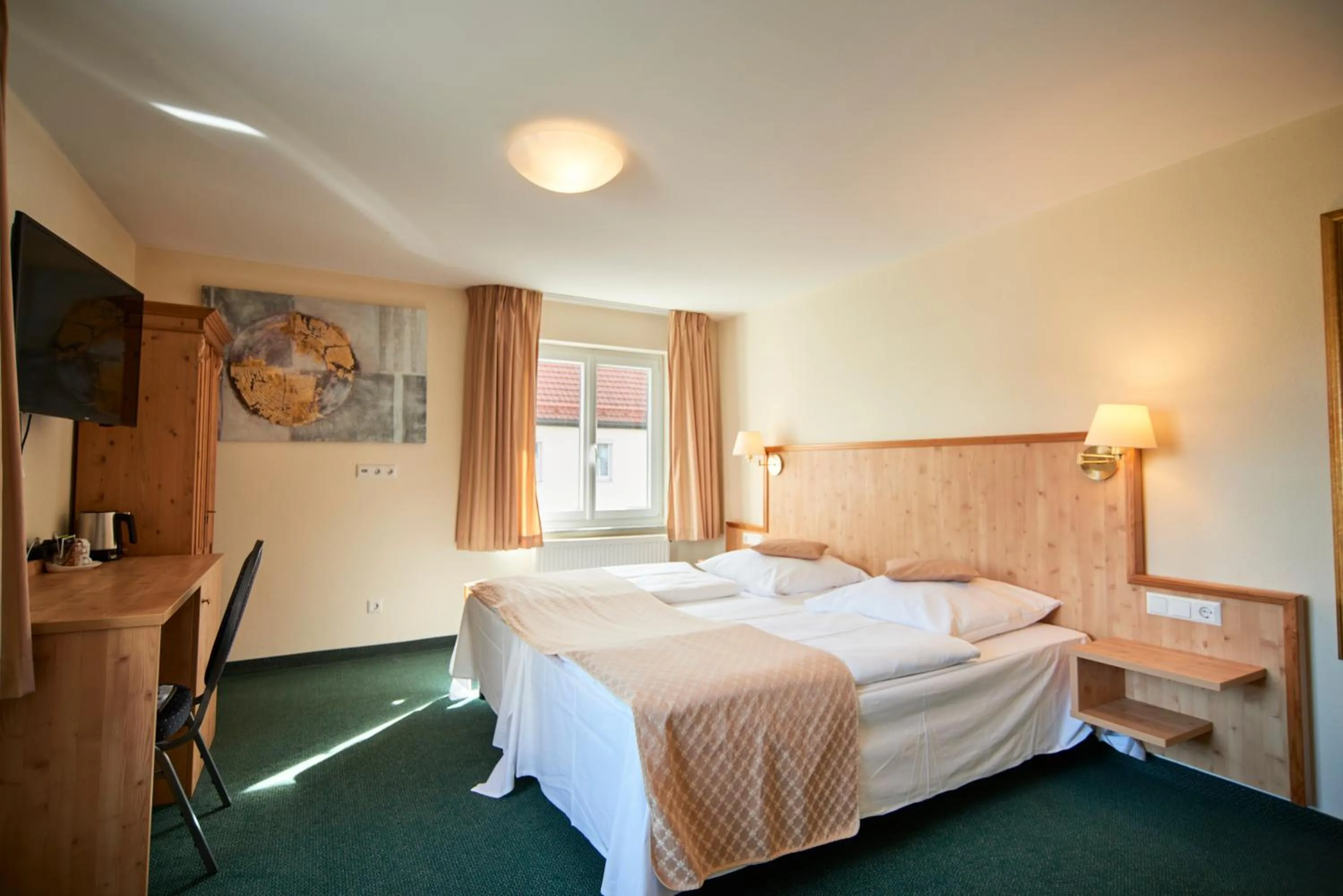 Bed in Hotel Restaurant Adler