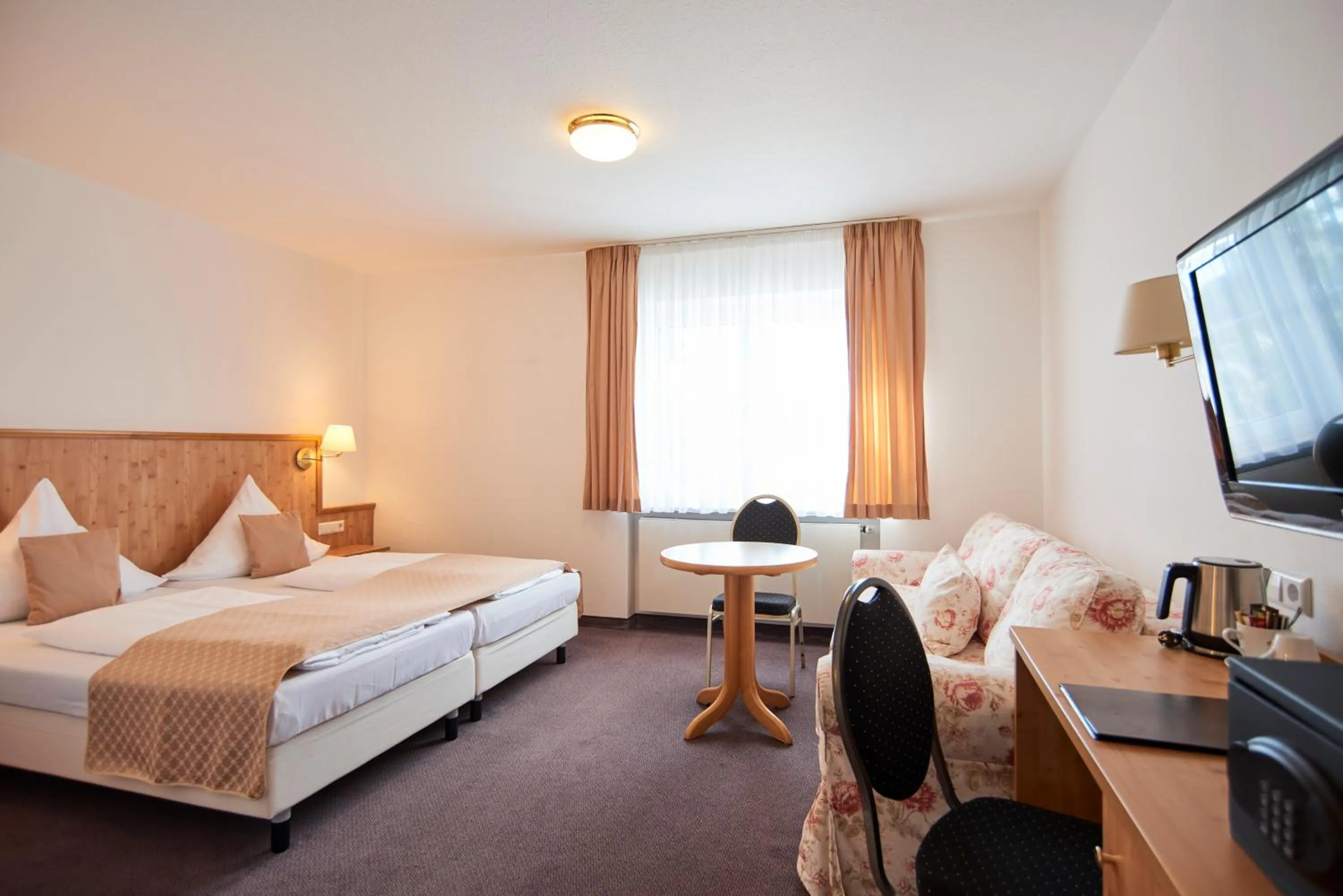 Bed in Hotel Restaurant Adler