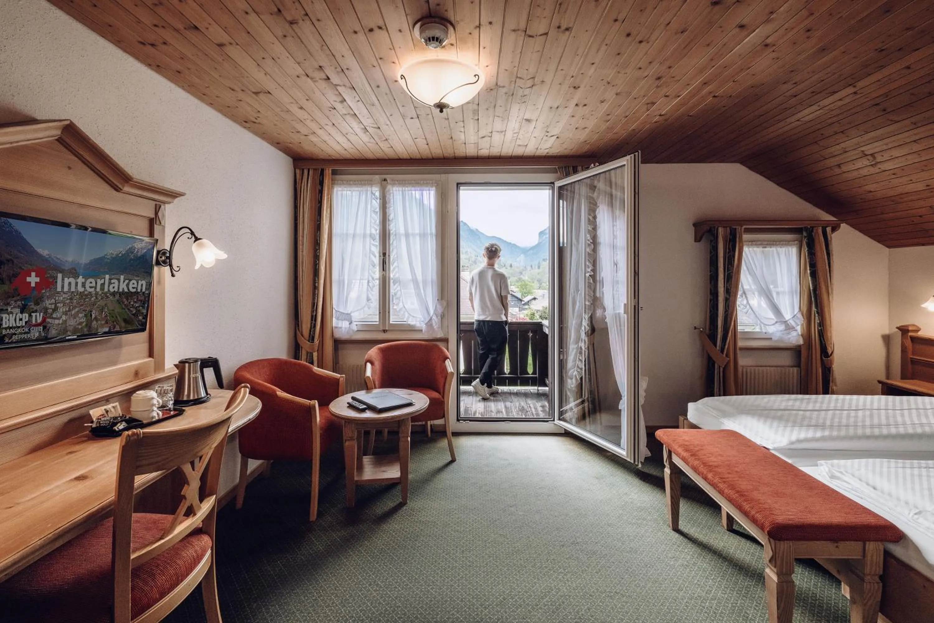 View (from property/room), Bed in Hotel Chalet Swiss