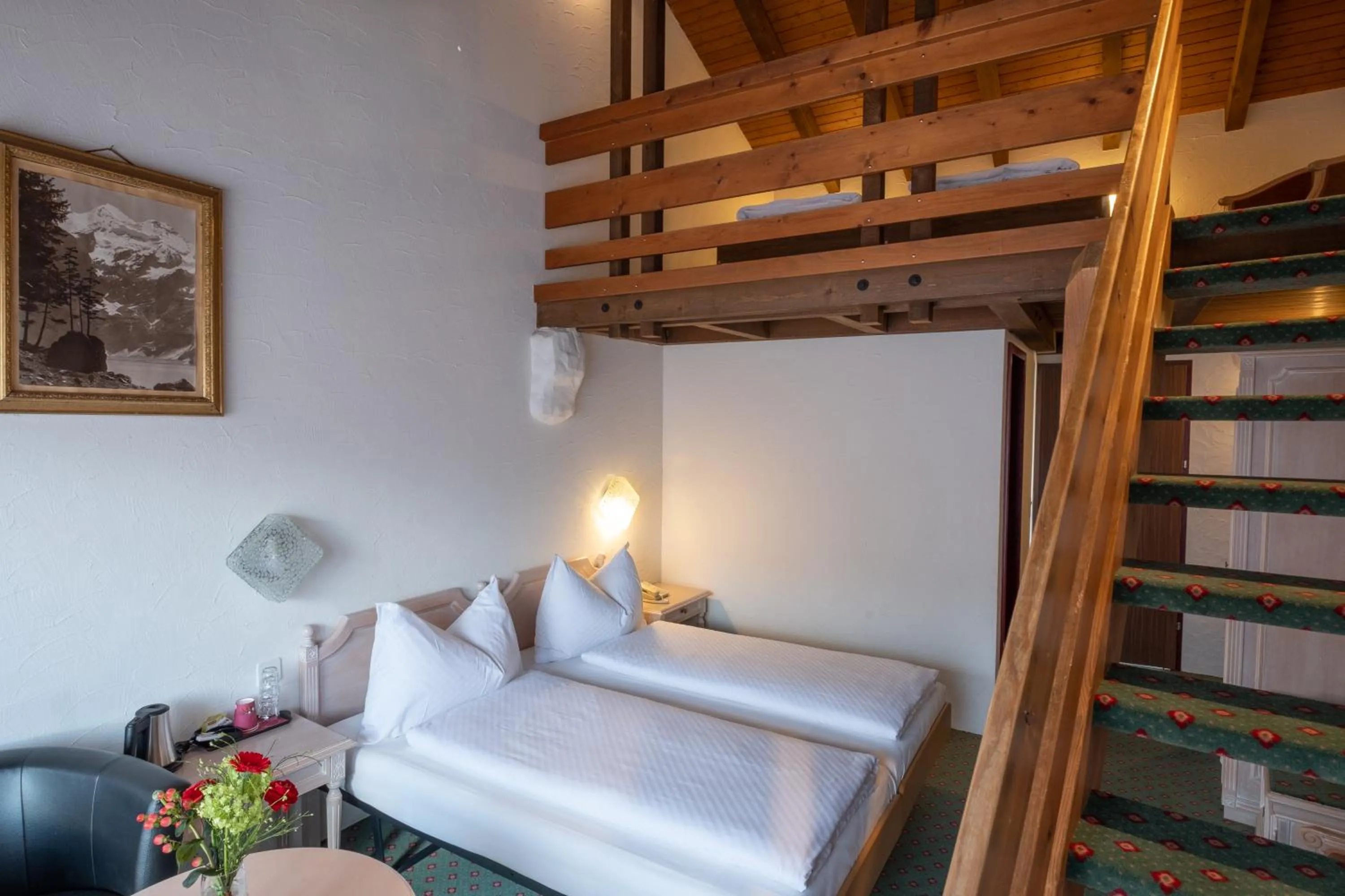 Bed in Hotel Chalet Swiss