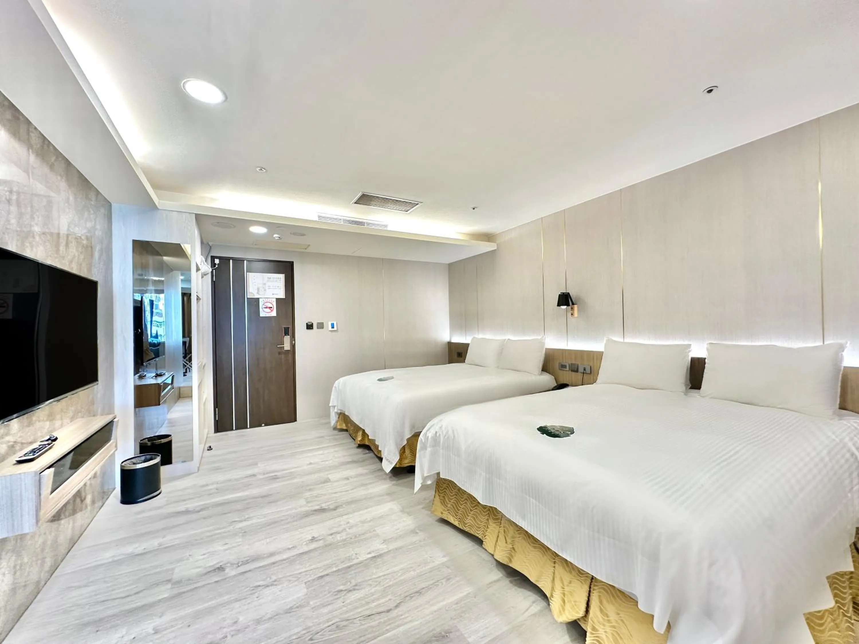 Bed in Grand Earl Hotel