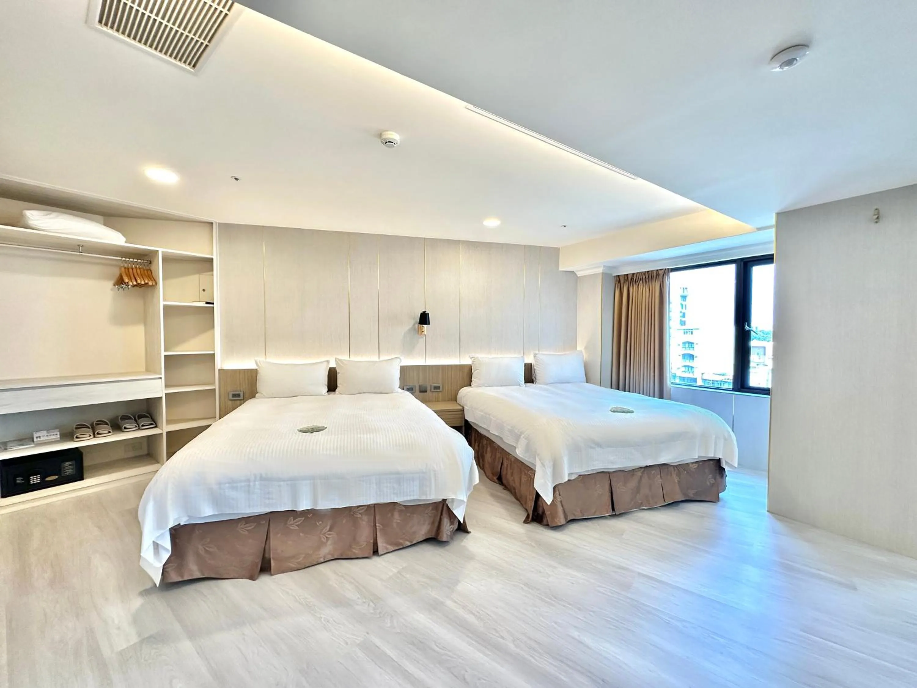 Bed in Grand Earl Hotel