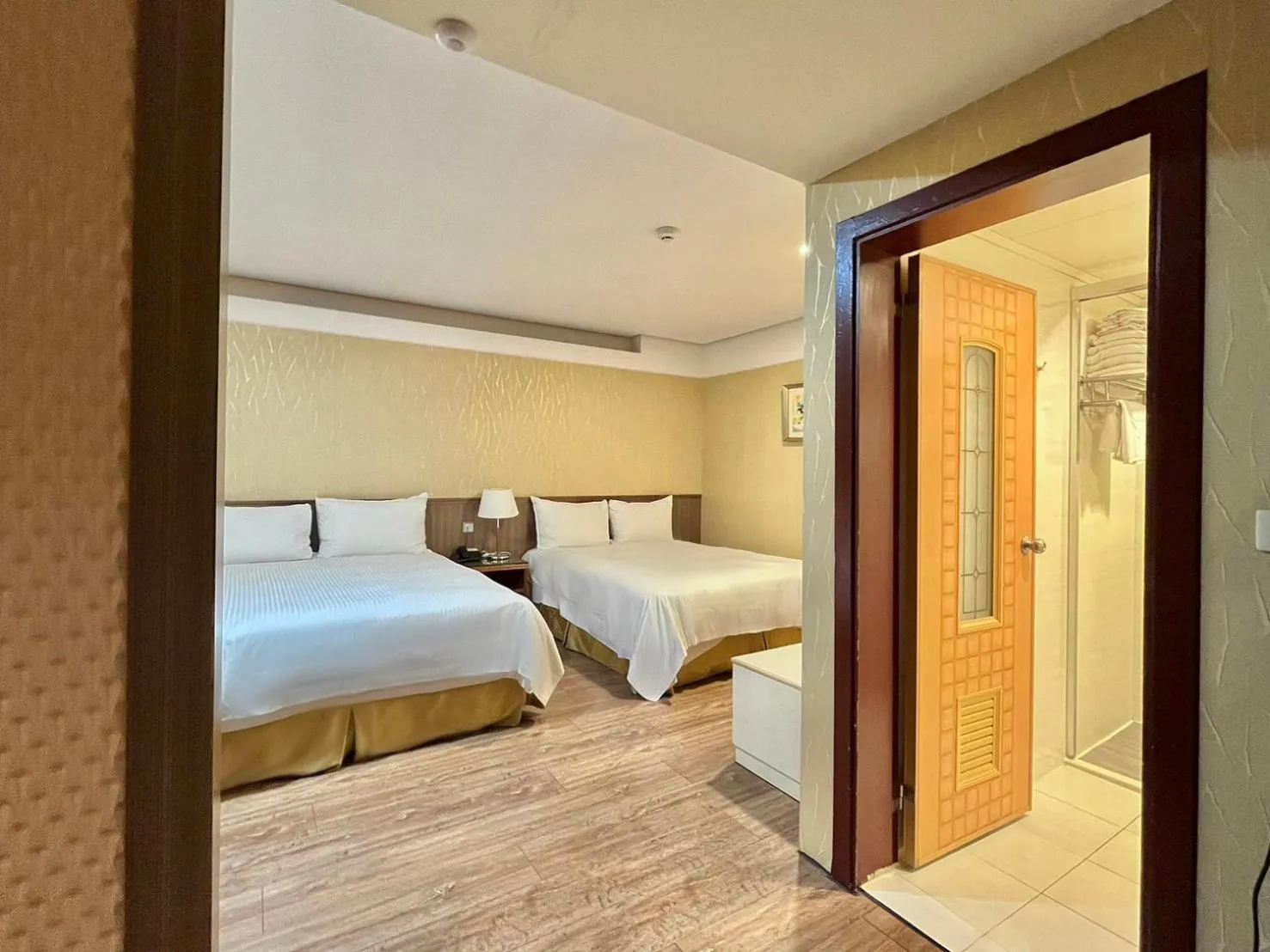 Bed in Grand Earl Hotel