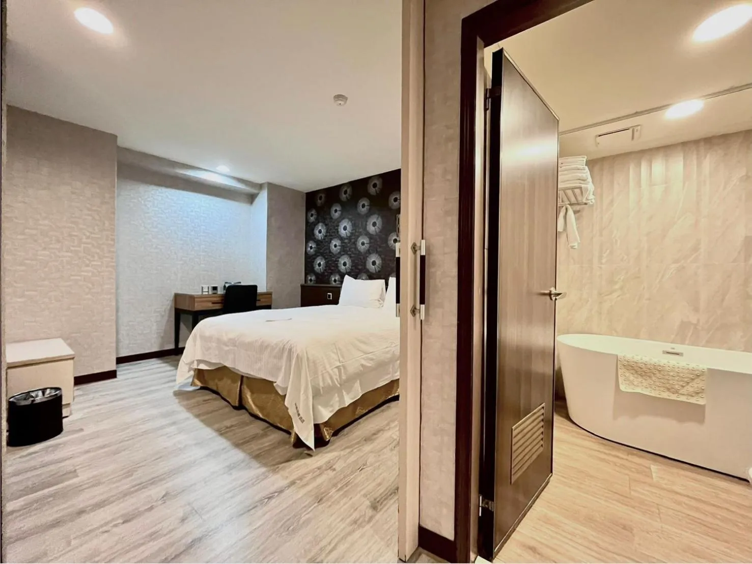 Bed in Grand Earl Hotel